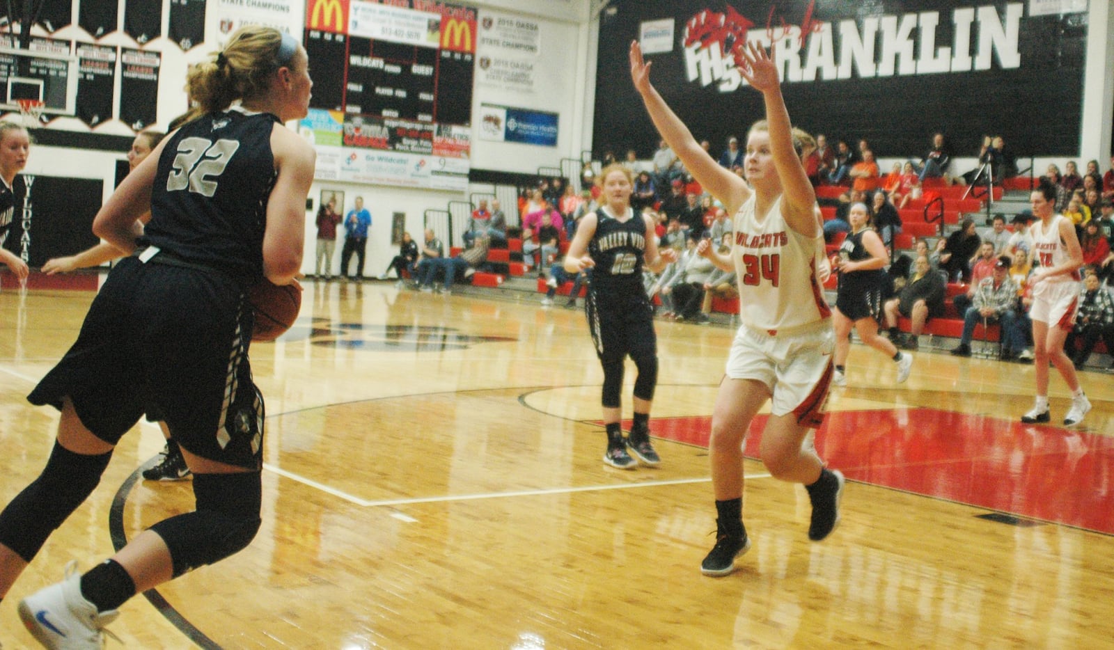 Franklin’s Brooke Stover (34) applies defensive pressure to Valley View’s Aubrey Stupp during Monday night’s game at Darrell Hedric Gym in Franklin. The host Wildcats won 55-45. RICK CASSANO/STAFF