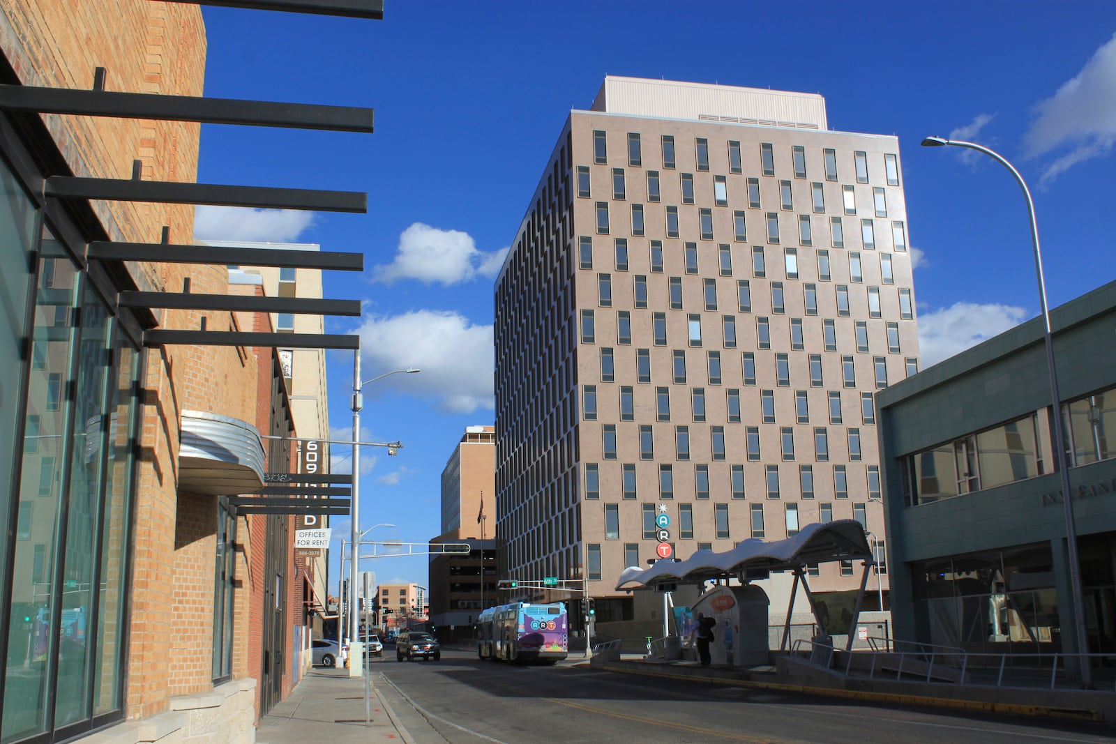 The Dennis Chavez Federal Building towers over Gold Avenue in downtown Albuquerque, N.M., on Tuesday, March 4, 2025. (AP Photo/Susan Montoya Bryan)