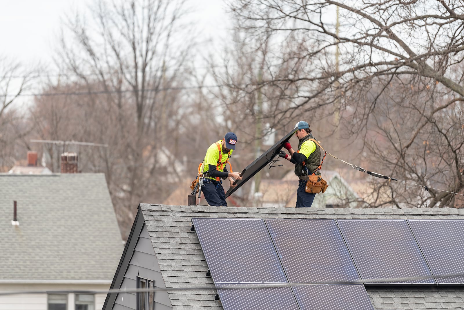 Better Together Solar Installing roof panels in Cuyahoga County as part of the Cuyahoga Solar Co-Op.