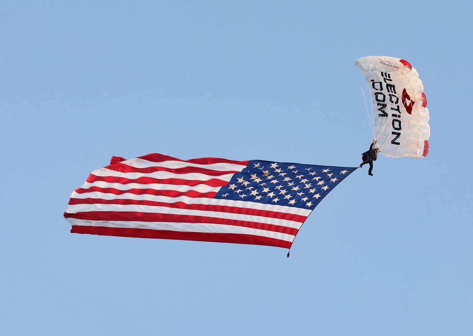 The Ohio Challenge hot air balloon festival is Friday and Saturday at Smith Park in Middletown. Thursday morning, July 14, Middletown Mayor Nicole Condrey, with Team Fastrax, performed a jump carrying an American Flag and landed near Sean Askren's hot air balloons, DILLAGAF and Airheads, at Middletown Regional Airport/Hook Field. NICK GRAHAM/STAFF