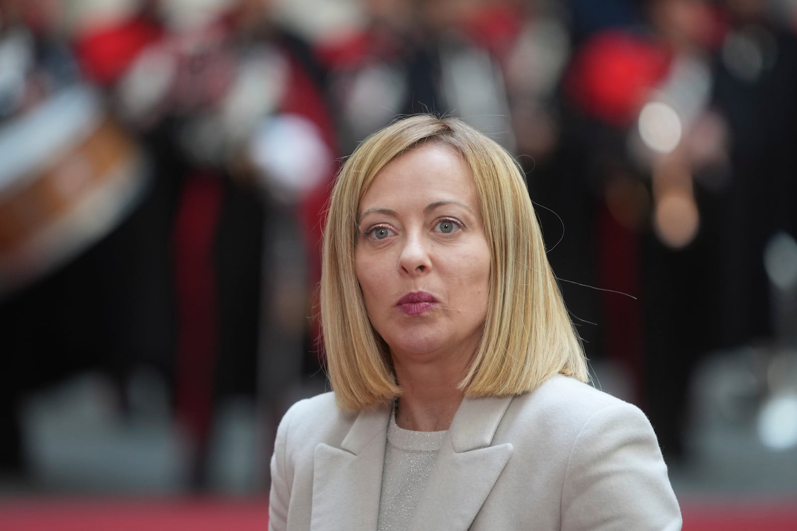 Italy's Prime Minister Giorgia Meloni waits for Austria's Chancellor Alexander Schallenberg at Chigi Palace government office in Rome, Monday, Feb. 10, 2025. (AP Photo/Alessandra Tarantino)