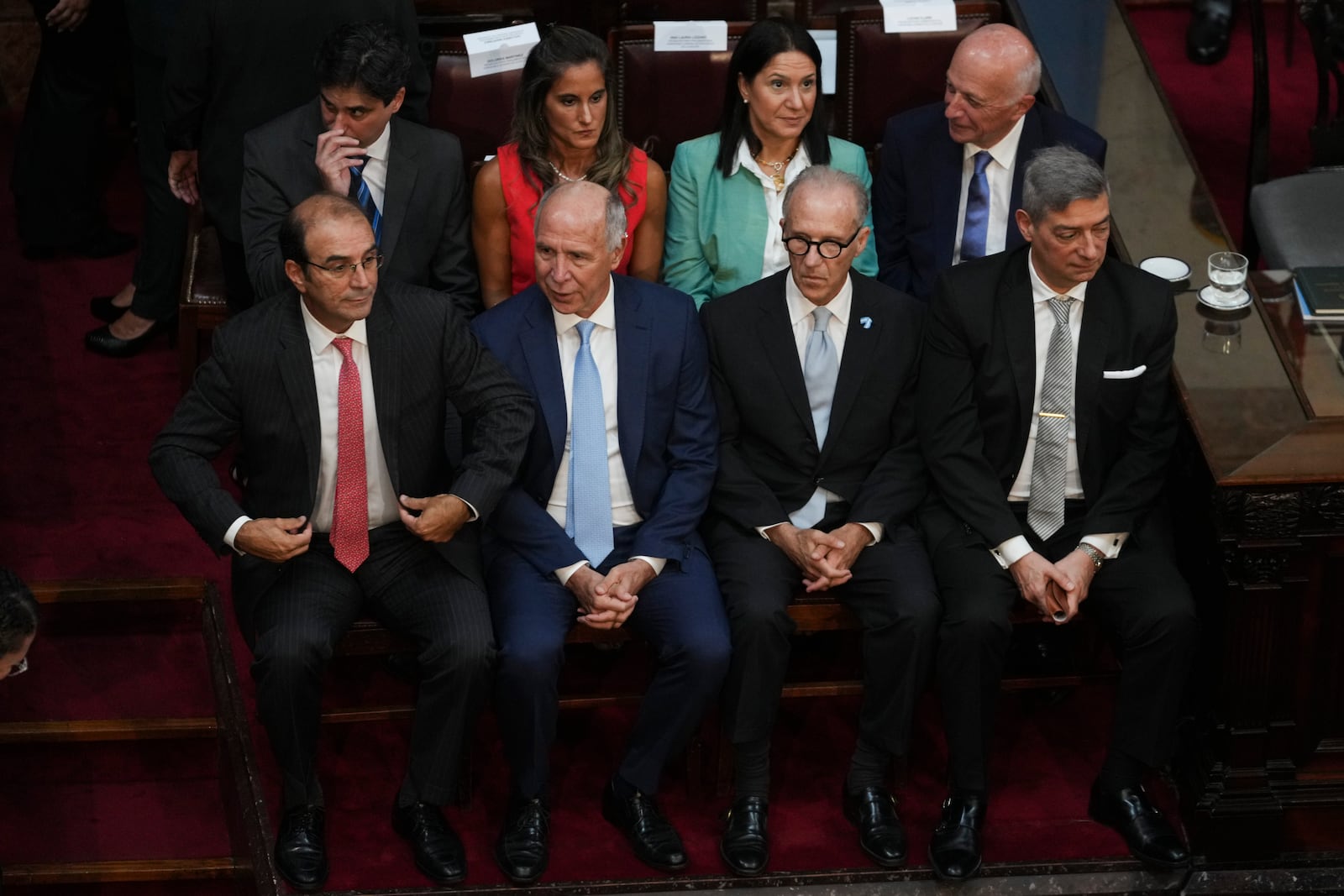 Argentina's Supreme Court justices, from left, Manuel García Mansilla, Ricardo Lorenzetti, Carlos Rosenkrantz and Horacio Rosatti, wait for the arrival of Argentina's President Javier Milei during the annual State of the Nation address, which marks the start of the legislative year, in Buenos Aires, Argentina, Saturday, March 1, 2025. (AP Photo/Rodrigo Abd)