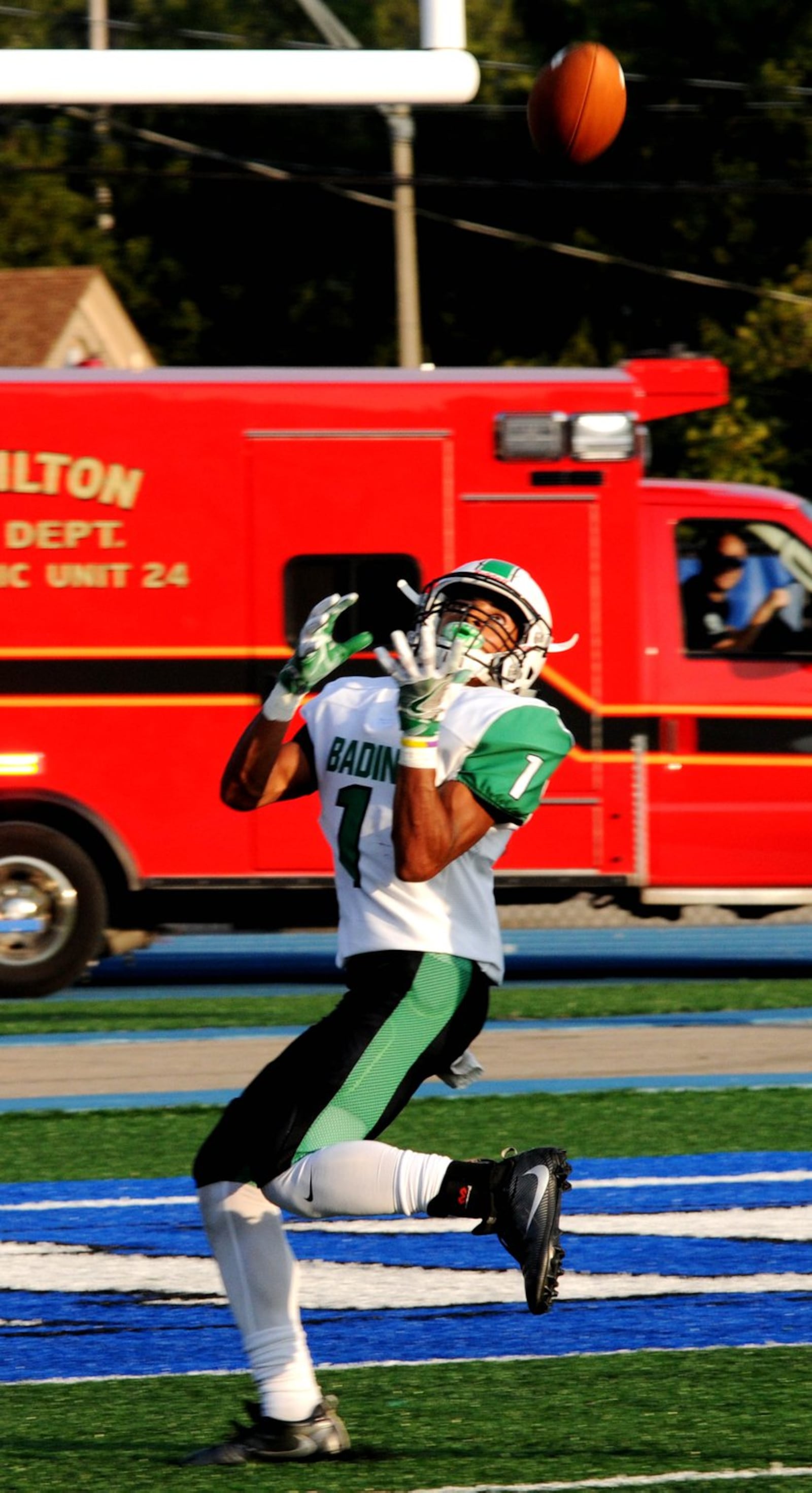 Badin’s Davon Starks hauls in a 36-yard touchdown pass from Jordan Flaig on Friday night in a 36-6 win over Ross in the Skyline Chili Crosstown Showdown at Hamilton’s Virgil Schwarm Stadium. CONTRIBUTED PHOTO BY DAVID A. MOODIE