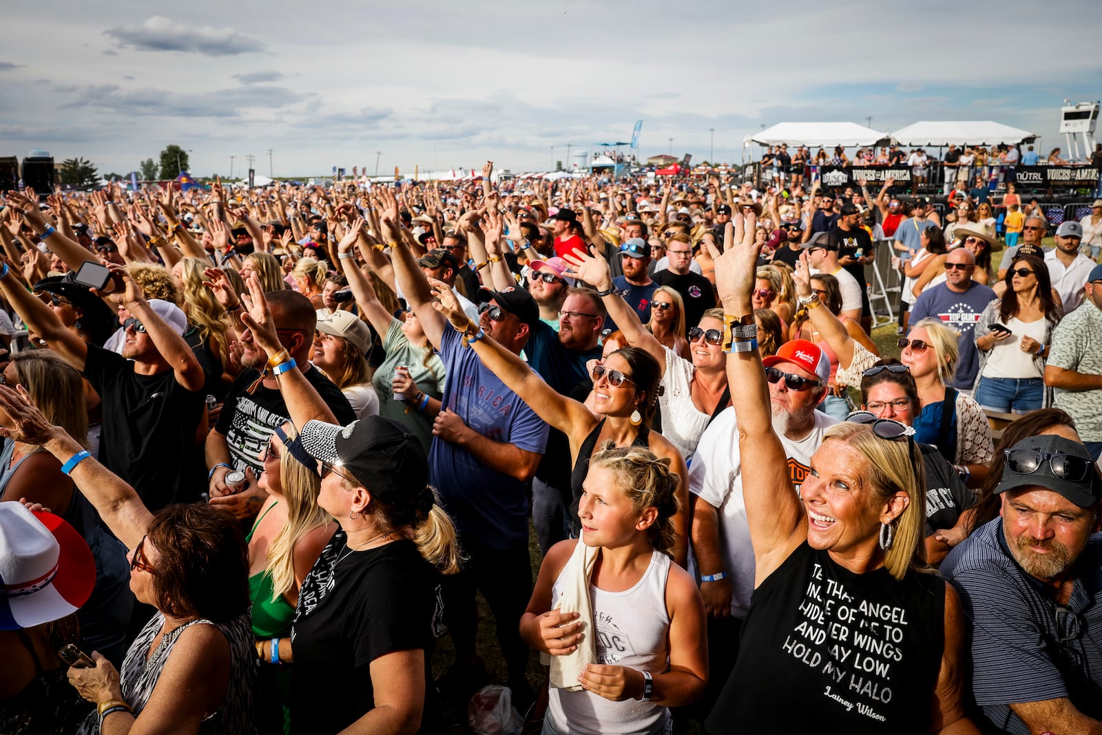 Thousands of fans gather on day four of the first Voices of America Country Music Fest Sunday, Aug. 13, 2023 on the grounds of National Voice of America Museum of Broadcasting in West Chester Township. NICK GRAHAM/STAFF