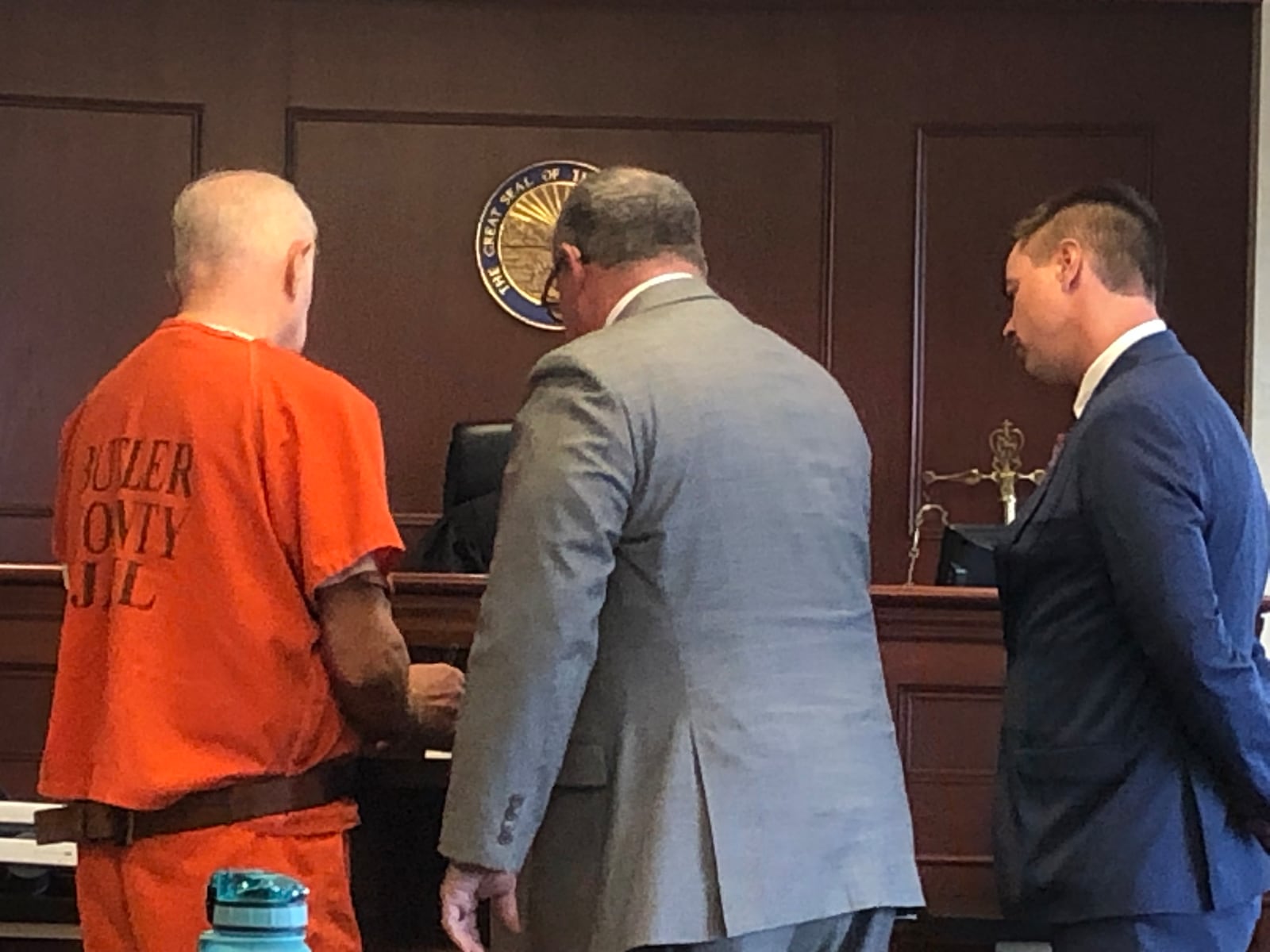 Former Trenton police officer Danny Greene, represented by two attorneys, was sentenced to life in prison with parole possible after 15 years Wednesday afternoon in Butler County Common Pleas Court. RICK McCRABB/STAFF