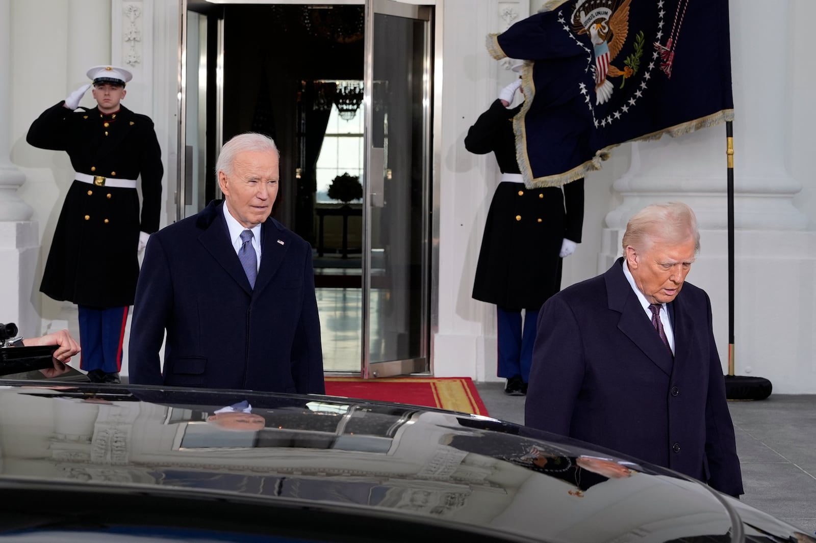 President Joe Biden and President-elect Donald Trump walk out to the presidential limosine, as they depart the White House, Monday, Jan. 20, 2025, in Washington, enroute to the Capitol. (AP Photo/Alex Brandon)