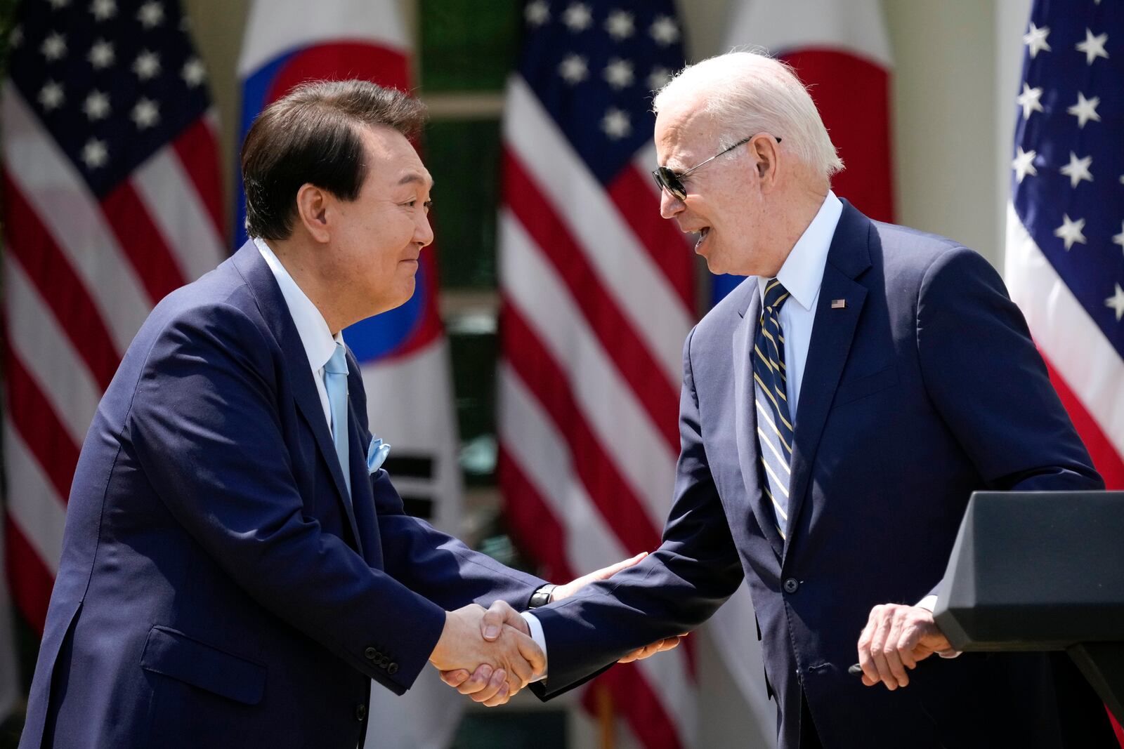 FILE - President Joe Biden, right, and South Korea's President Yoon Suk Yeol shake hands during a news conference in the Rose Garden of the White House, April 26, 2023, in Washington. (AP Photo/Andrew Harnik, File)