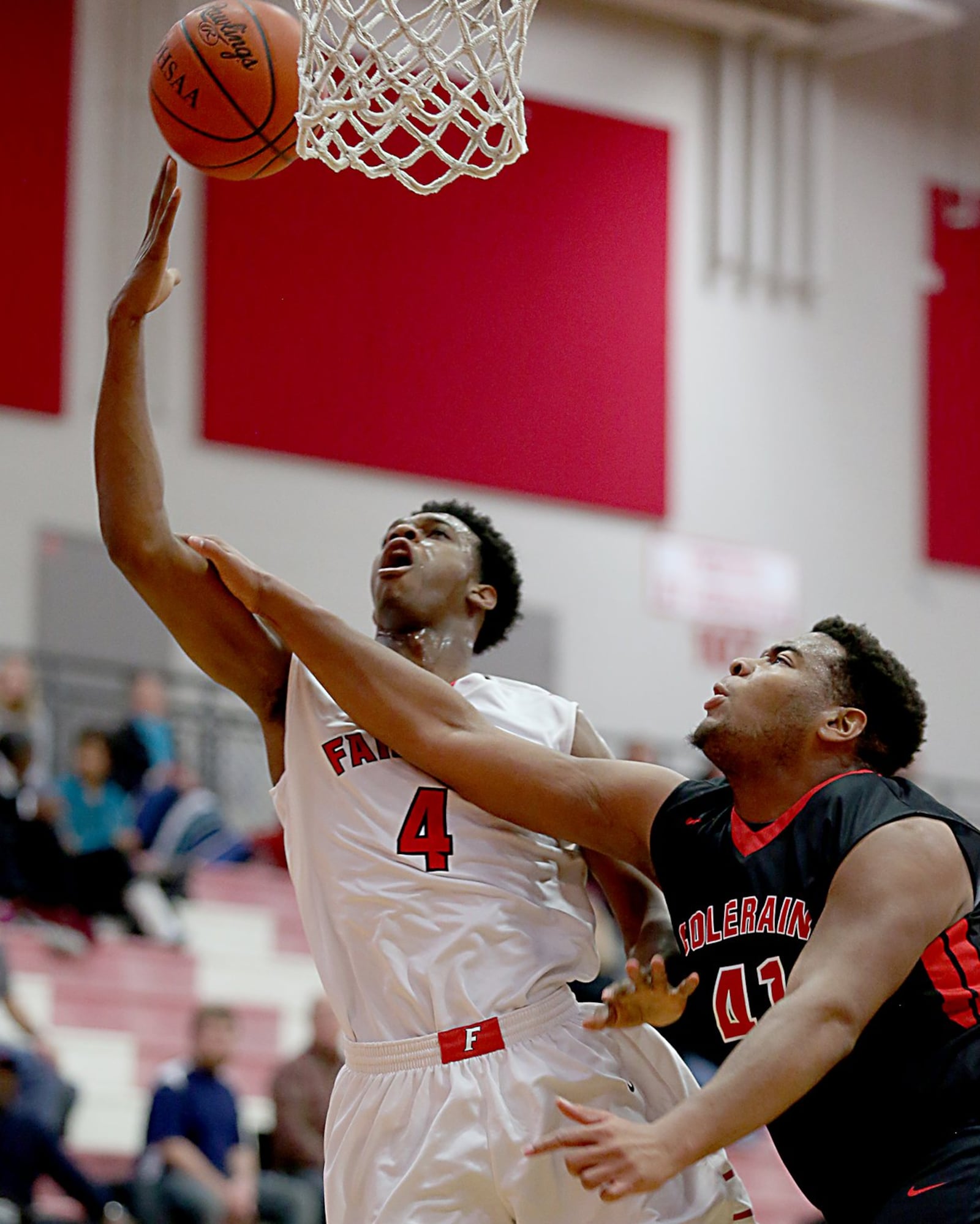 Fairfield forward Devonte Ross is fouled in the act of shooting by Colerain’s Tahj Roberts during Tuesday night’s game at Fairfield Arena. CONTRIBUTED PHOTO BY E.L. HUBBARD