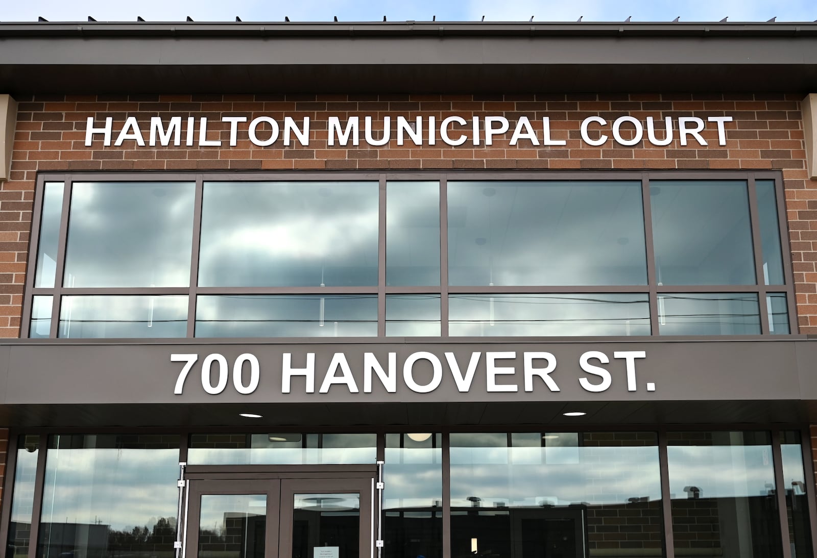 The Hamilton Municipal Court is set to open in early 2025 at 700 Hanover Street, vacating the third floor of the Hamilton city administration offices on at 345 High St. The Hamilton Police Department has begun the move-in process to the 64,000-square-foot, $32 million Hamilton Justice Center that spans from South 8th Street to Hanover Street, and sits across from the Butler County Sheriff's Office. MICHAEL D. PITMAN/STAFF