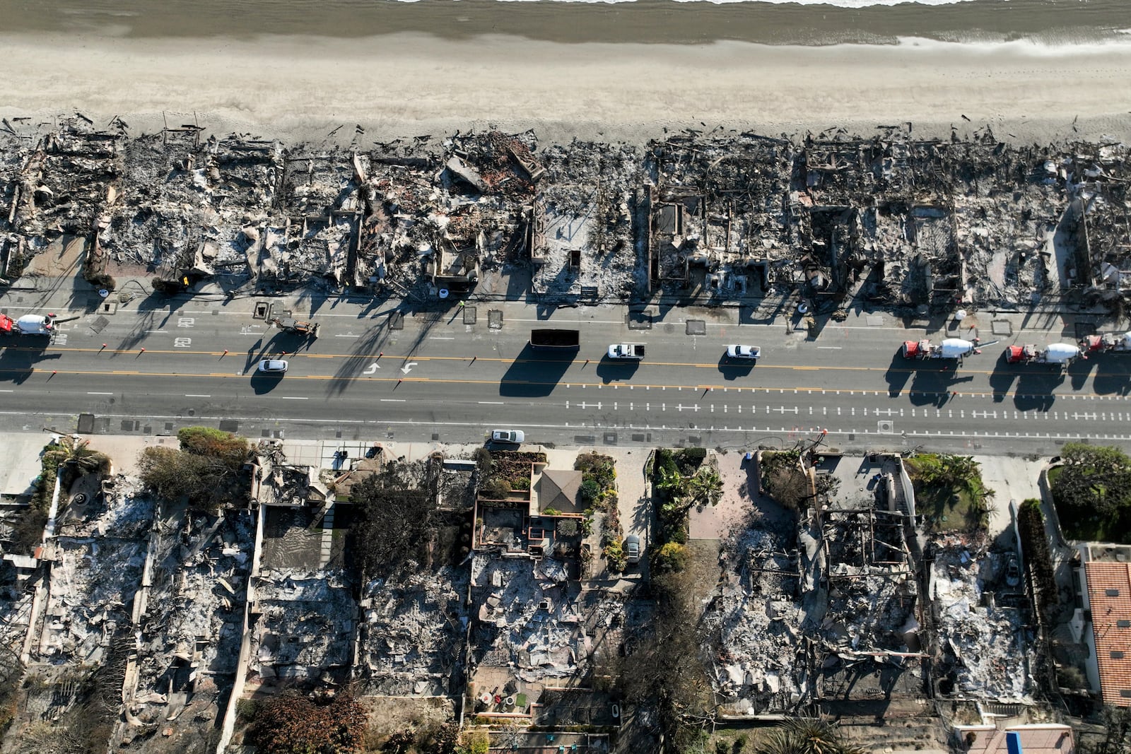 FILE - An aerial view shows the devastation from the Palisades Fire on beachfront homes Wednesday, Jan. 15, 2025 in Malibu, Calif. (AP Photo/Jae C. Hong, File)