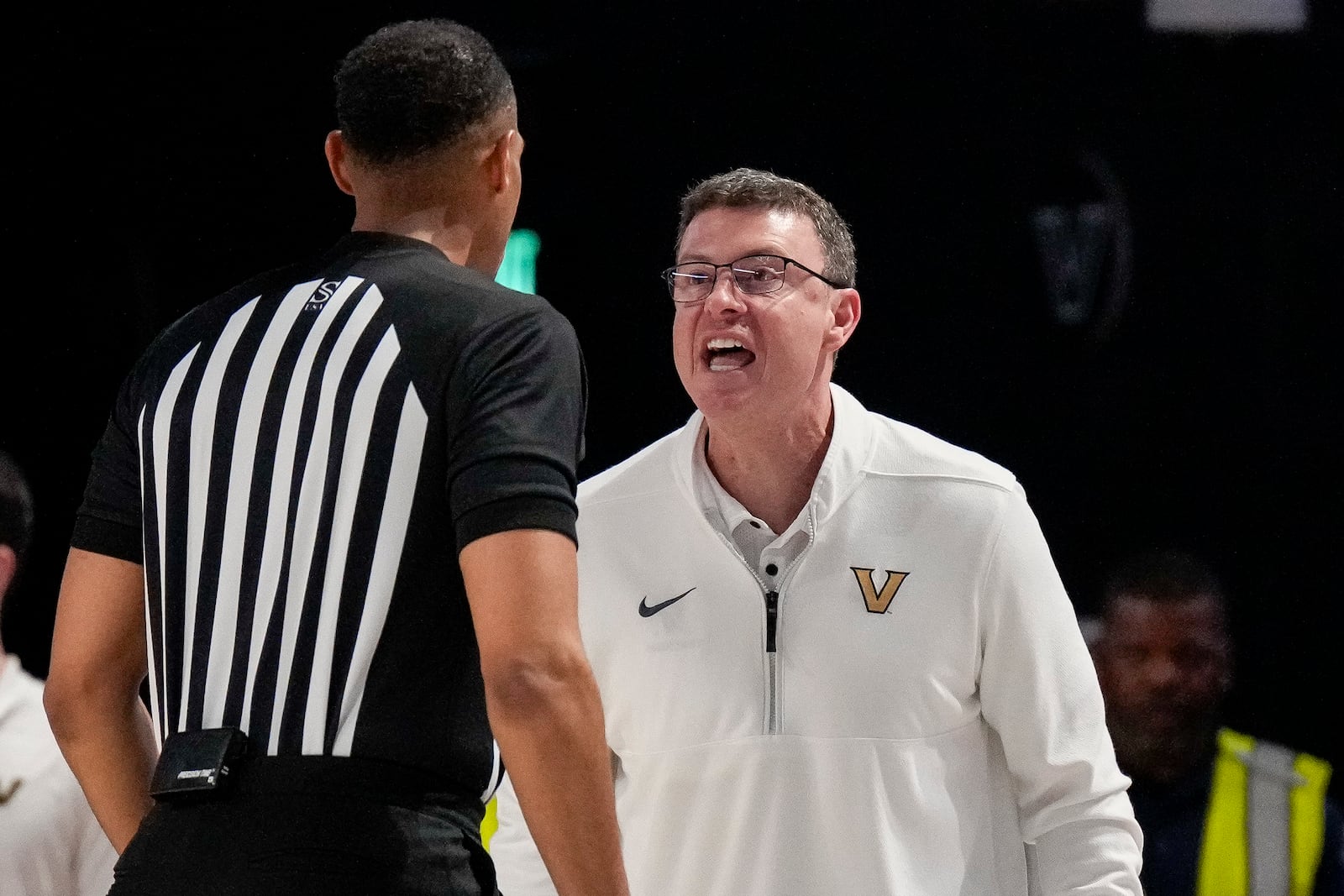 Vanderbilt head coach Mark Byington yells at an official during the first half of an NCAA college basketball game against Auburn, Tuesday, Feb. 11, 2025, in Nashville, Tenn. (AP Photo/George Walker IV)