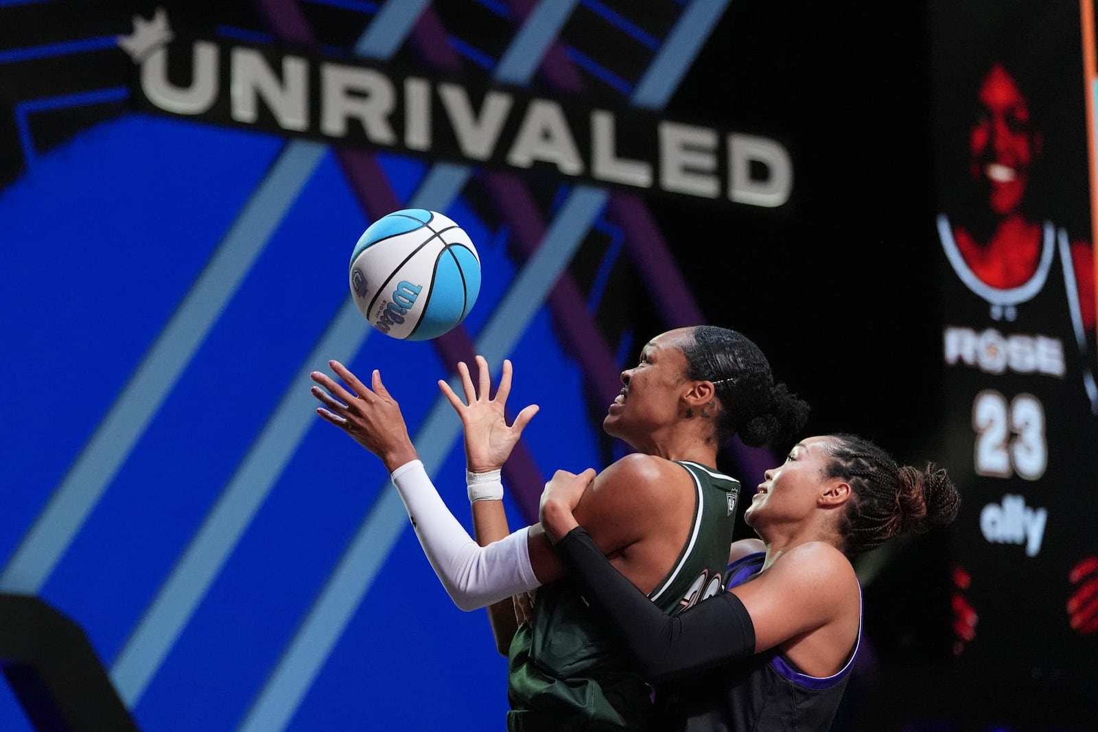 Napheesa Collier, right, defends a shot by Azura Stevens in their Unrivaled 1-on-1 basketball semifinal, Friday, Feb. 14, 2025, in Medley, Fla. (AP Photo/Rebecca Blackwell)