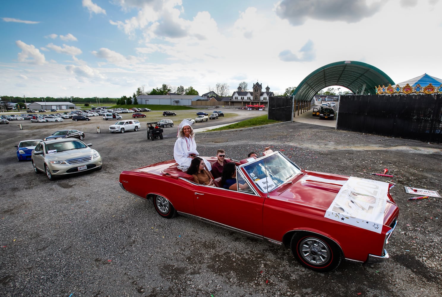 Madison High School drive-thru graduation ceremony at Land of Illusion