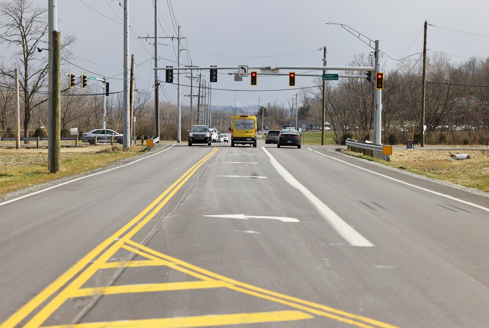 The Ohio Dept. of Transportation added left turn lanes on U.S. 27 in both directions at Hamilton New London Road, Herman Road and Ross Millville Road. This one shows U.S. 27 at New London. NICK GRAHAM/STAFF