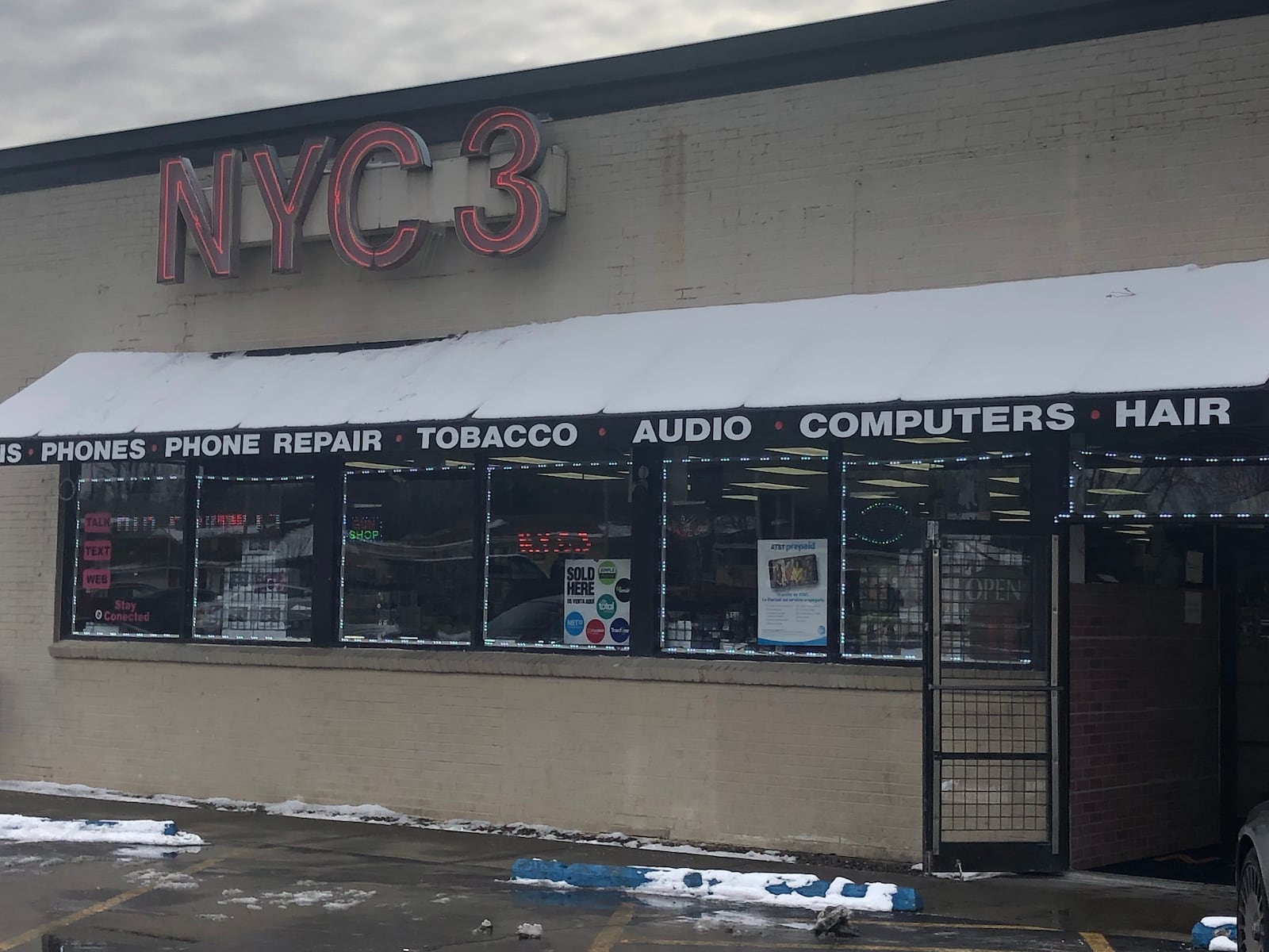 About 30 firearms and 60 iPhones were stolen during a burglary around 2:30 a.m. Saturday at NYC3, a cell phone store at 3212 Roosevelt Blvd. RICK McCRABB/STAFF