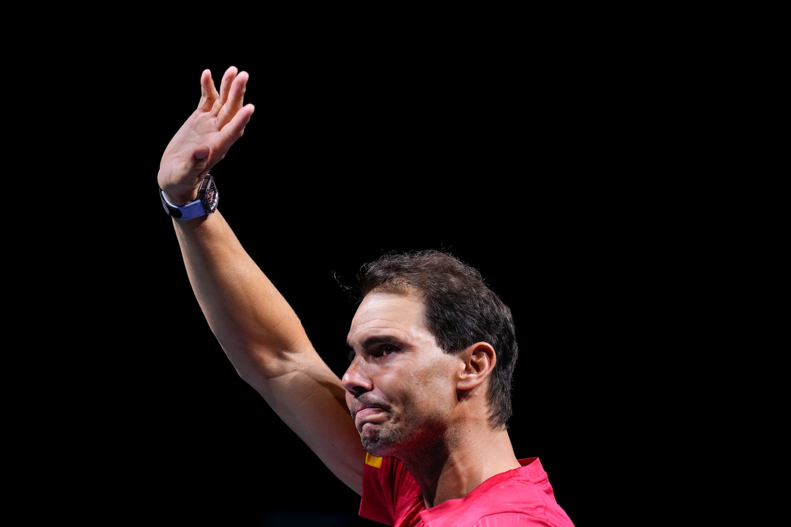 FILE - Spain's Rafael Nadal waves to the crowd during a tribute after playing his last match as a professional in the Davis Cup quarterfinals at the Martin Carpena Sports Hall in Malaga, southern Spain, early Wednesday, Nov. 20, 2024. (AP Photo/Manu Fernandez, File)