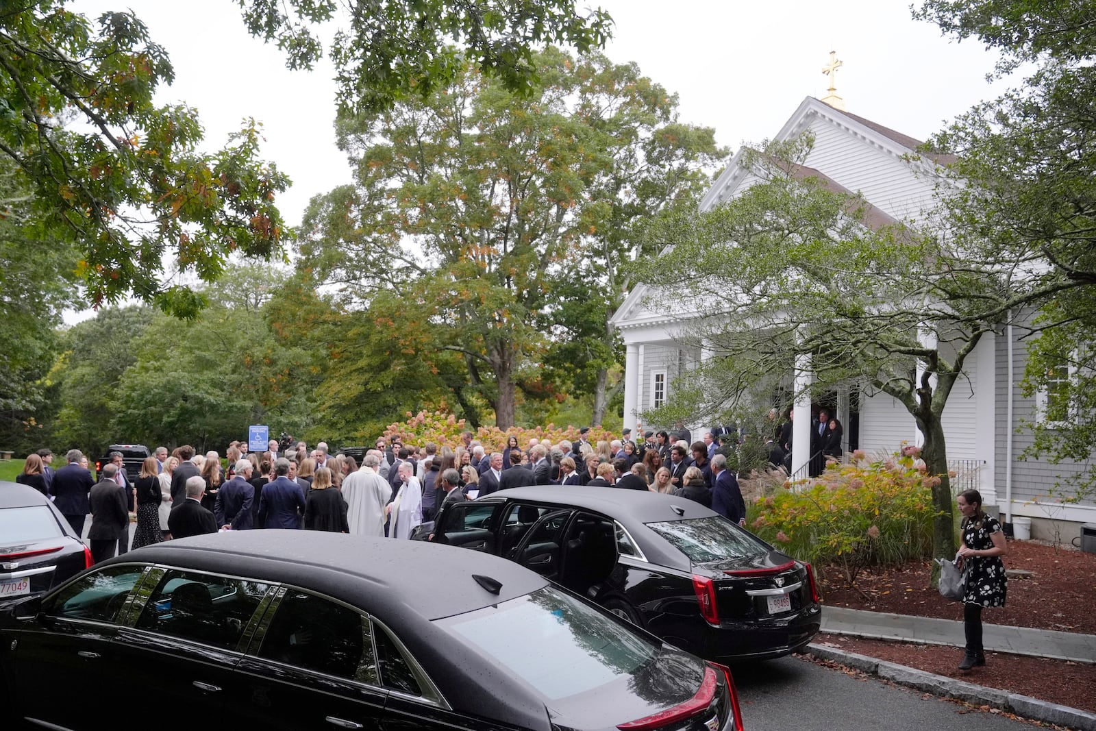 Mourners depart Our Lady of Victory church following funeral services for Ethel Kennedy, wife of the late Sen. Robert F. Kennedy, Monday, Oct. 14, 2024, in Centerville, Mass. (AP Photo/Steven Senne)