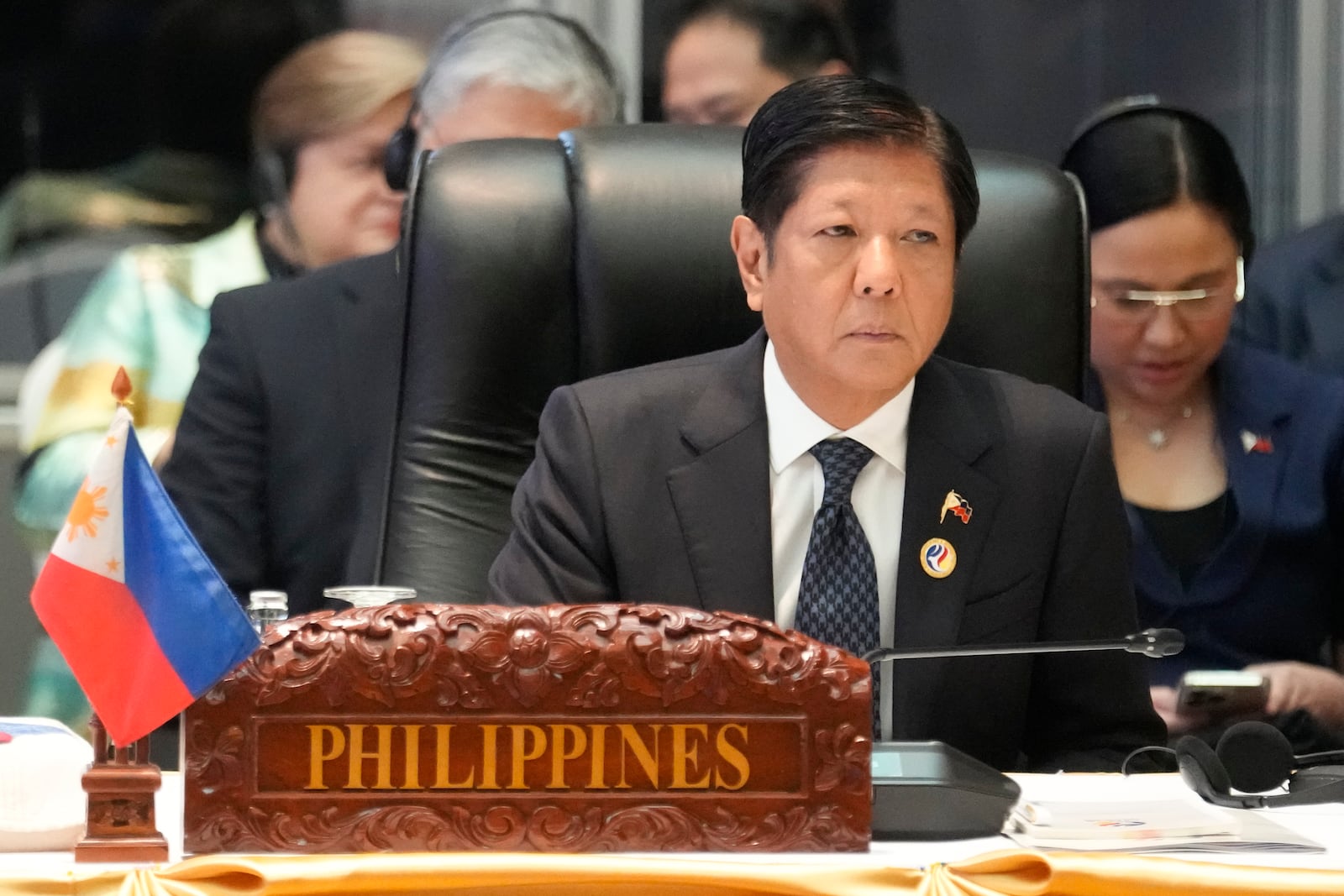 FILE - Philippine President Ferdinand Marcos Jr. listens during the 12th Association of Southeast Asian Nations (ASEAN) -U.S. Summit in Vientiane, Laos, Oct. 11, 2024. (AP Photo/Sakchai Lalit, File)