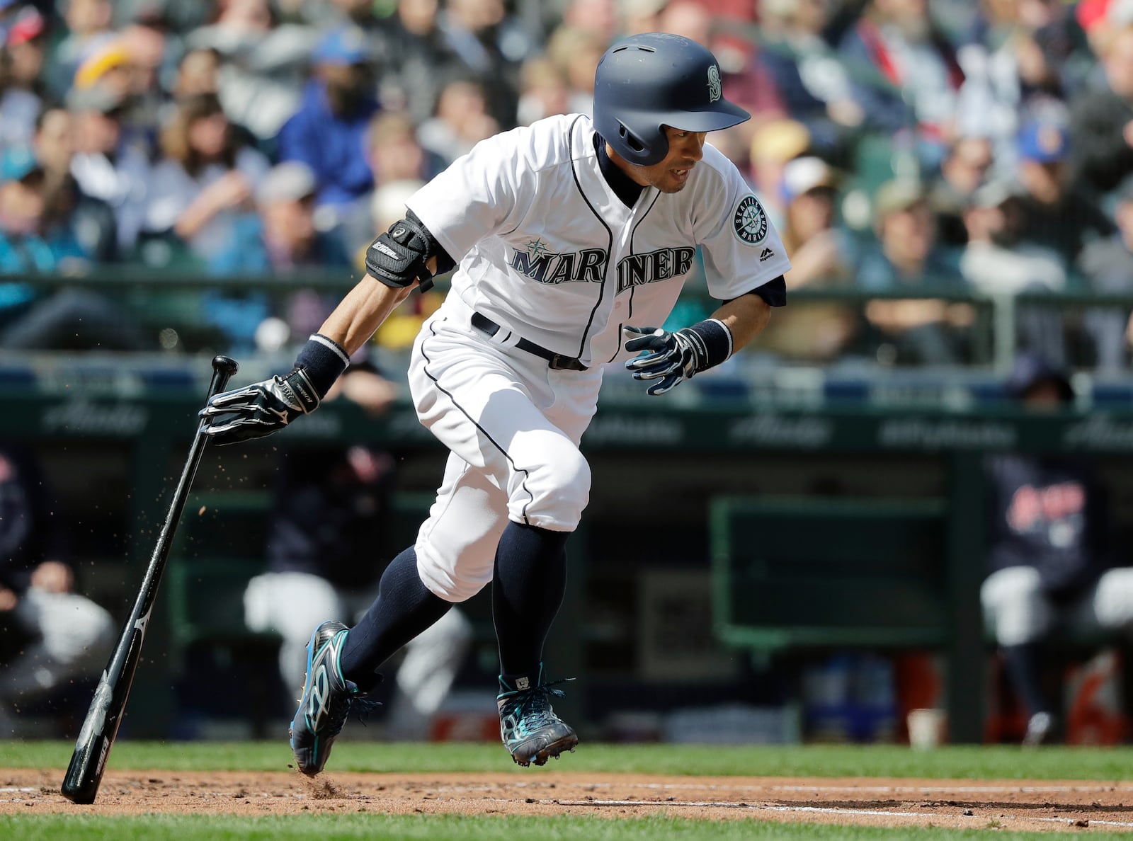 FILE - Seattle Mariners' Ichiro Suzuki heads to first base after hitting a single against the Cleveland Indians during the third inning of a baseball game March 31, 2018, in Seattle. (AP Photo/Ted S. Warren, File)