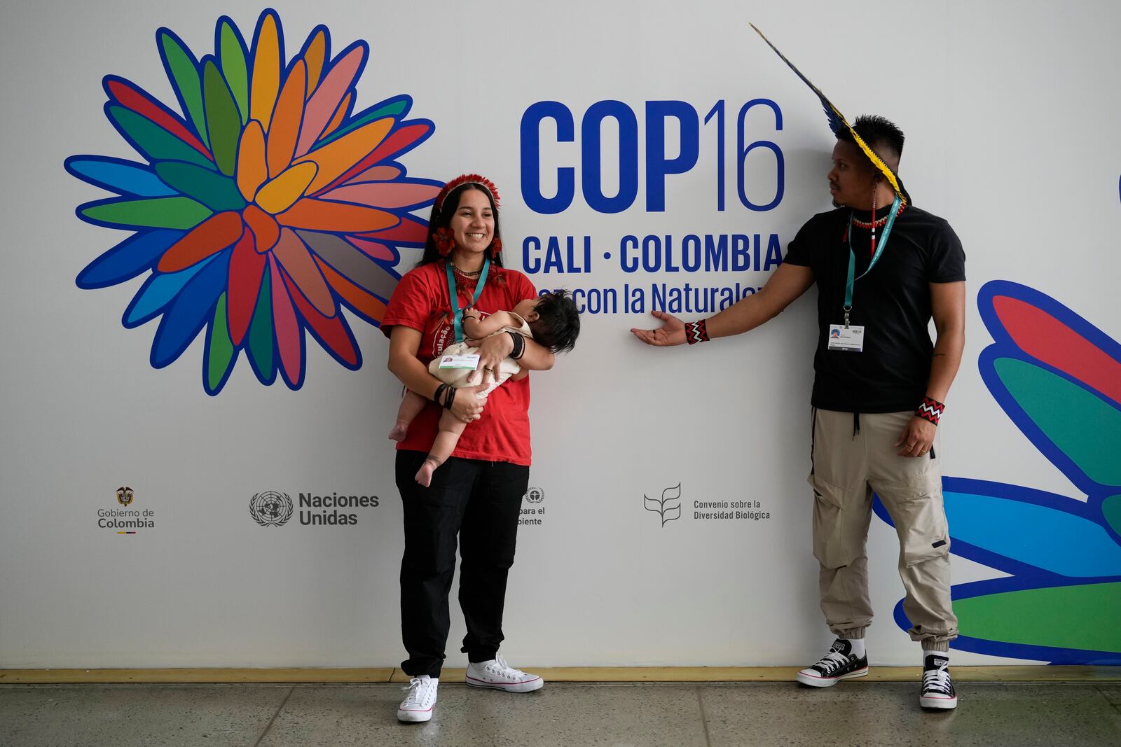 Members of Brazil's Indigenous delegation pose for photo before the opening ceremony of COP16, a United Nations' biodiversity conference, in Cali, Colombia, Sunday, Oct. 20, 2024. (AP Photo/Fernando Vergara)