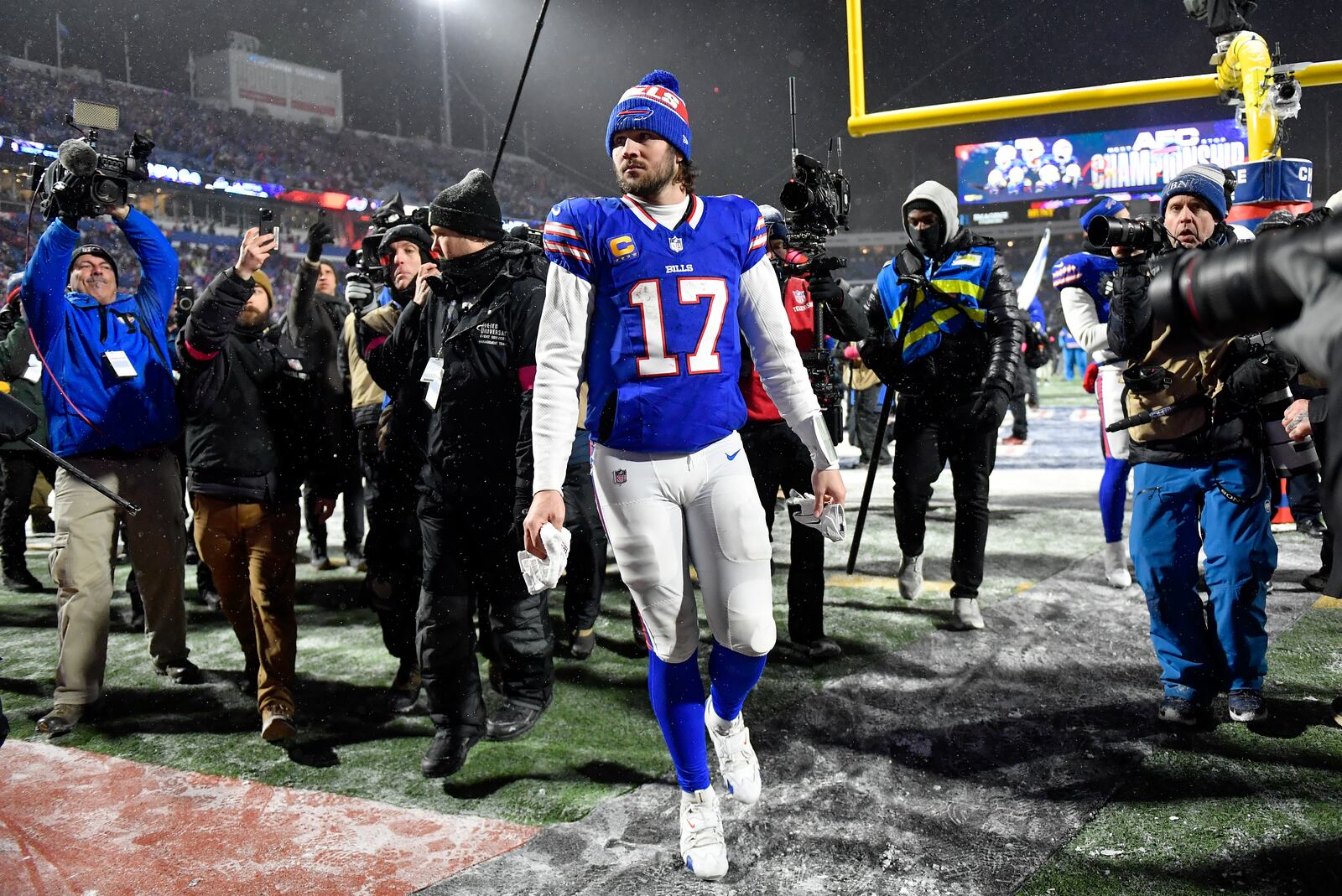 Buffalo Bills quarterback Josh Allen (17) walks off the field after playing against the Baltimore Ravens in an NFL divisional playoff football game, Sunday, Jan. 19, 2025, in Orchard Park, N.Y. (AP Photo/Adrian Kraus)