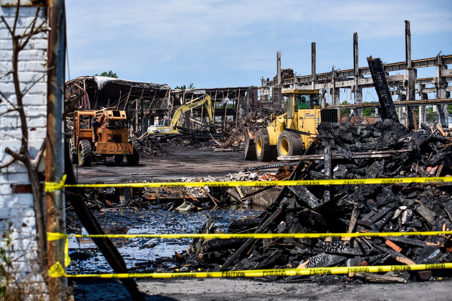 Crews demolish warehouse after massive fire in Hamilton