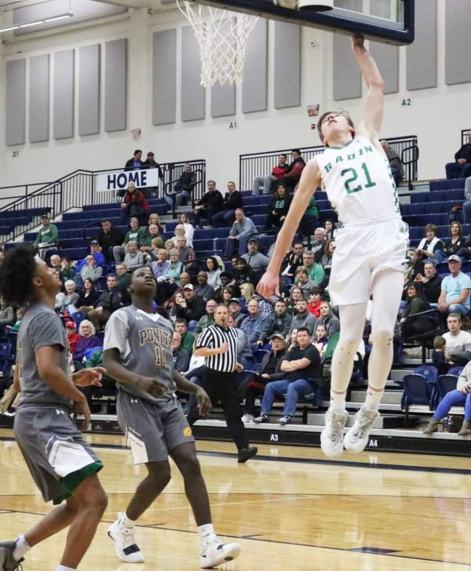 Badin’s Josh Hegemann (21) goes high a shot during Friday night’s Division II sectional basketball game against Ponitz at Fairmont’s Trent Arena in Kettering. Badin won 54-33. CONTRIBUTED PHOTO BY TERRI ADAMS