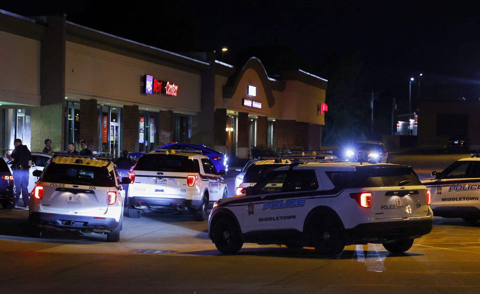 Police patrol the parking lot area behind White Castle on Roosevelt Blvd. Saturday night, Aug. 17, 2024 in Middletown. The area is popular cruising spot for car enthusiasts. NICK GRAHAM/STFF