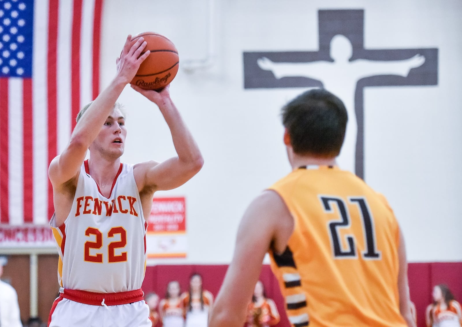 Fenwick’s C.J. Napier puts up a shot over Alter’s Connor Bazelak during Friday night’s game in Middletown. Alter won 56-38. NICK GRAHAM/STAFF