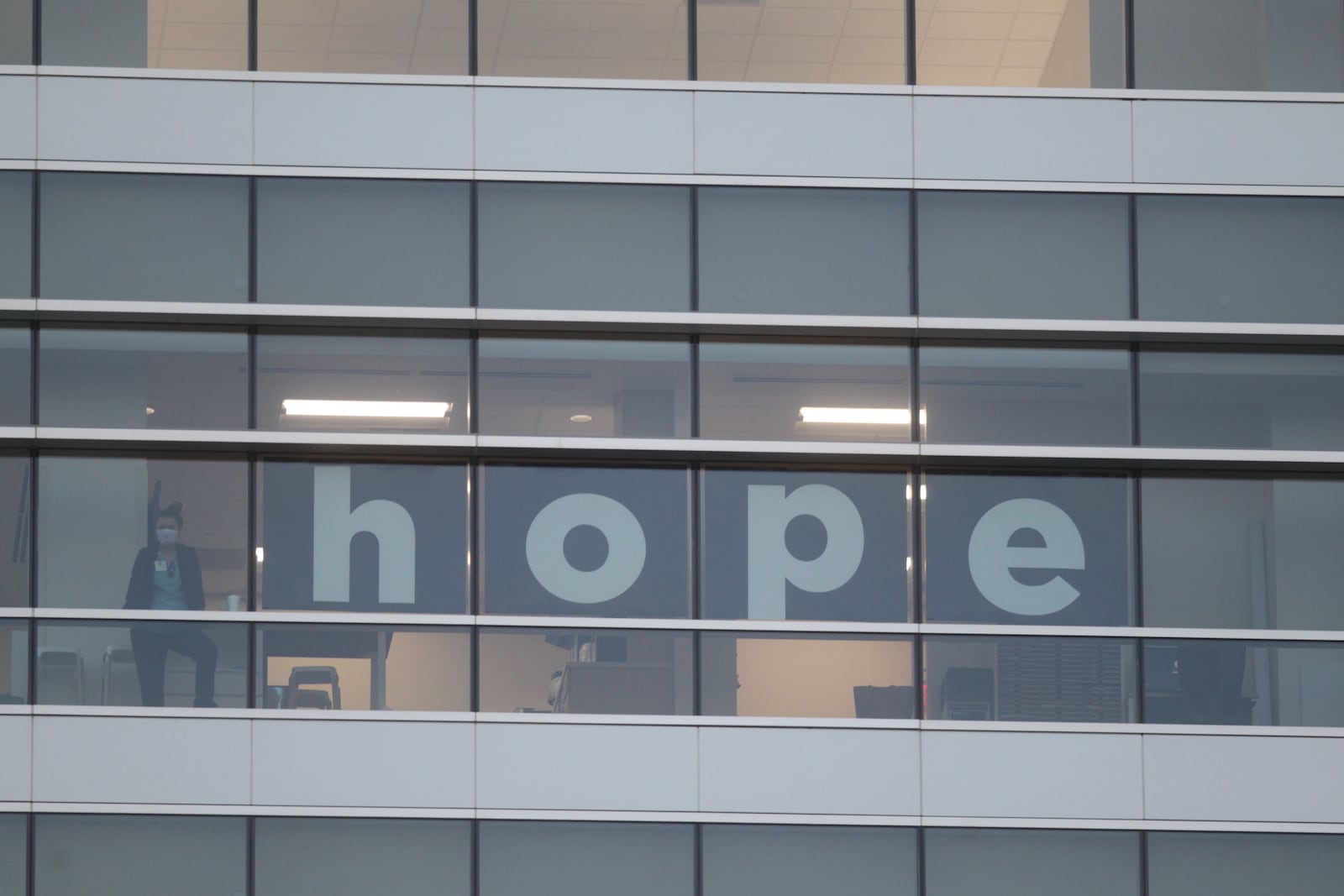 File - First responders flashed "Goodnight Lights" for Dayton Children’s Hospital patients on July 9, 2020. While the tradition began in September 2018, it took on a special meaning during the COVID-19 pandemic as measures to limit the spread of infection meant few visitors for the young patients beyond a parent or legal guardian. JIM NOELKER/STAFF