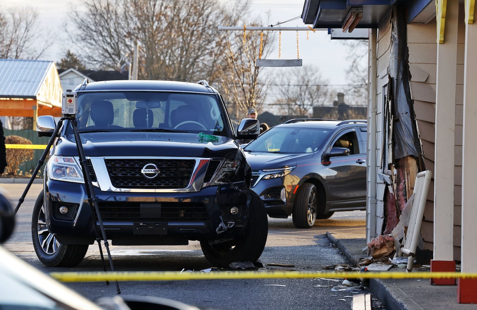 A vehicle crashed inro Jocko's Chicken and Seafood on Hogh Street in Hamilton Wednesday, Dec. 27, 2023. NICK GRAHAM/STAFF