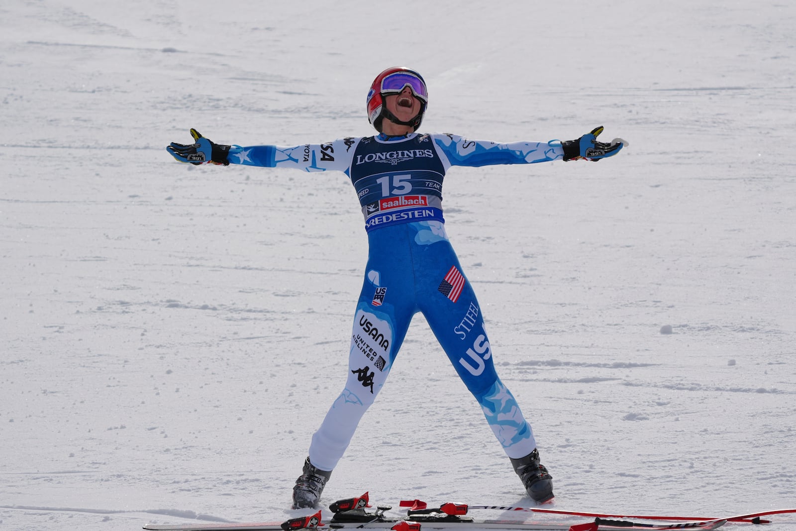 United States' Lauren Macuga celebrates at the finish area of a downhill run of a women's team combined event, at the Alpine Ski World Championships, in Saalbach-Hinterglemm, Austria, Tuesday, Feb. 11, 2025. (AP Photo/Giovanni Auletta)