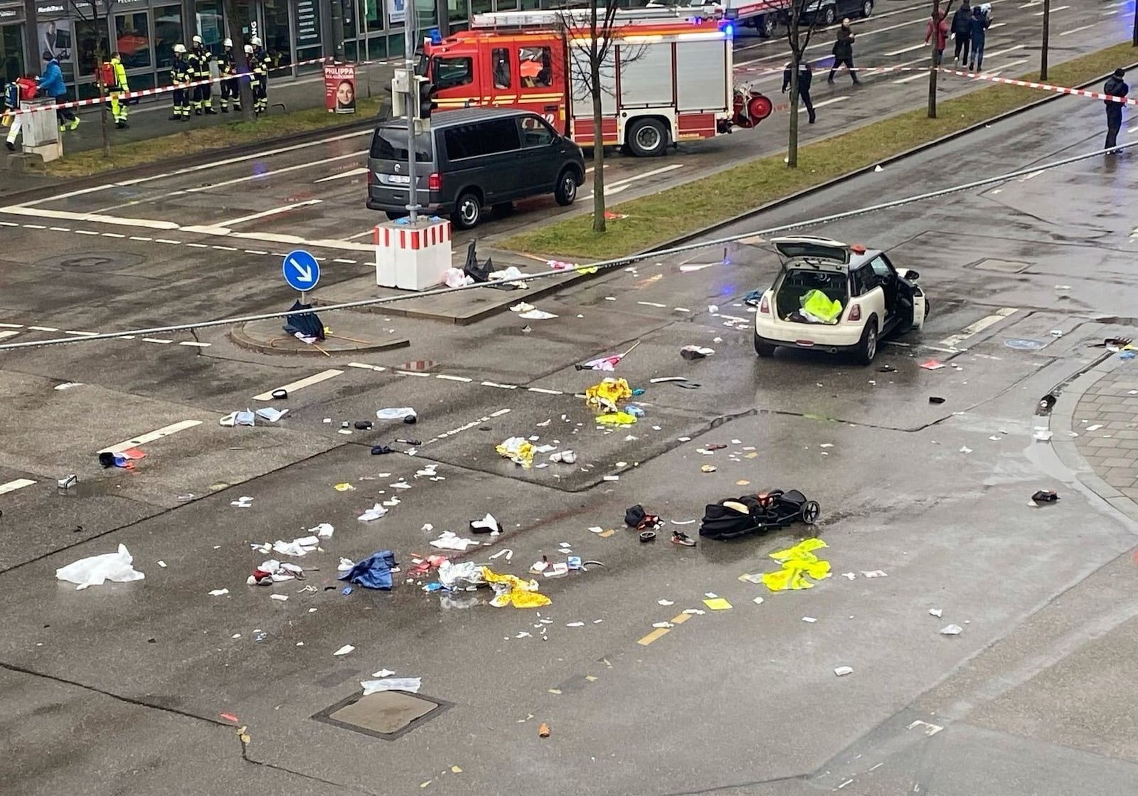 Emergency services attend the scene of an accident after a driver hit a group of people in Munich, Germany, Thursday Feb. 13, 2025. (Alexa Gr'f/dpa via AP)