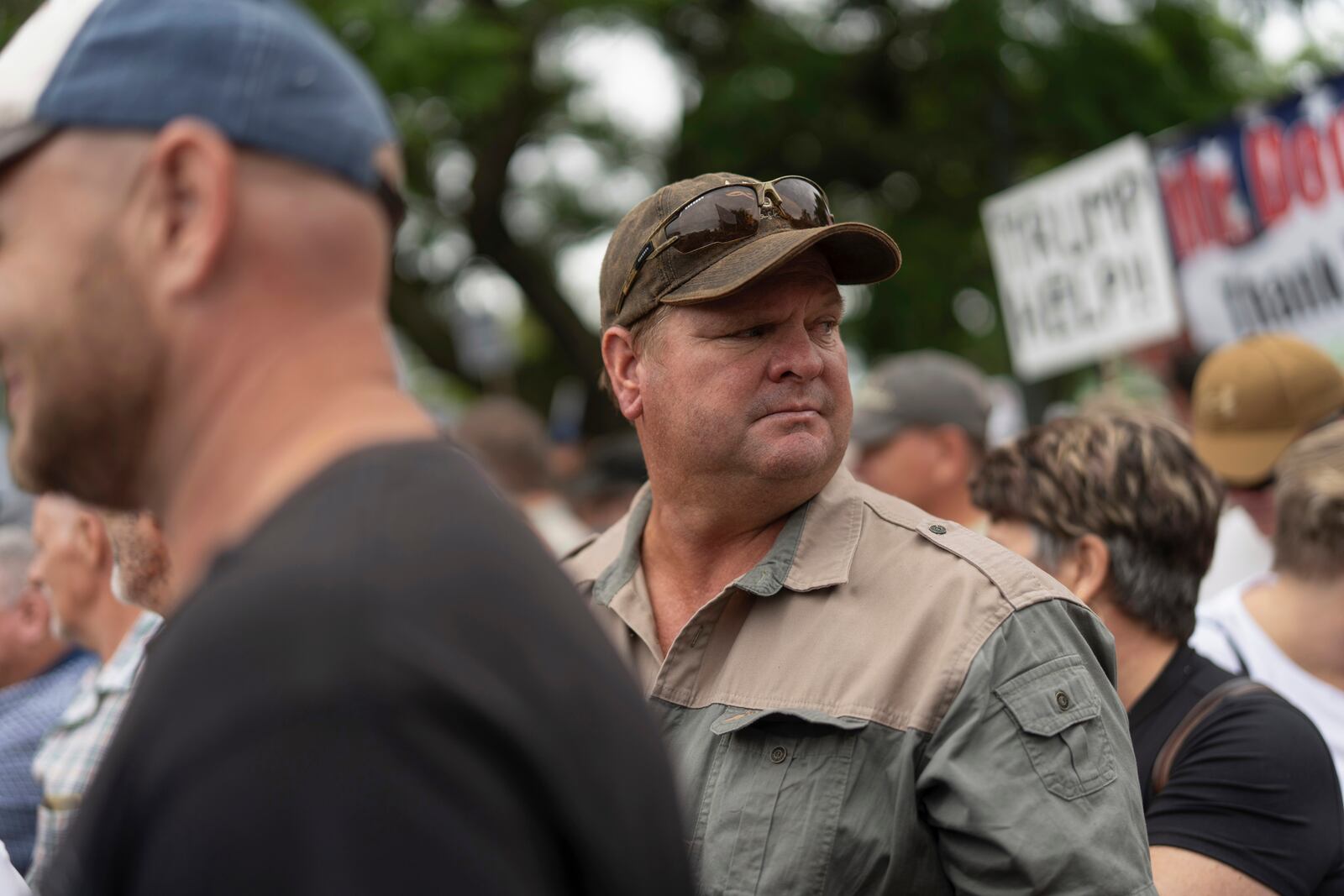 White South Africans demonstrate in support of U.S. President Donald Trump in front of the U.S. embassy in Pretoria, South Africa, Saturday, Feb. 15, 2025. (AP Photo/Jerome Delay)