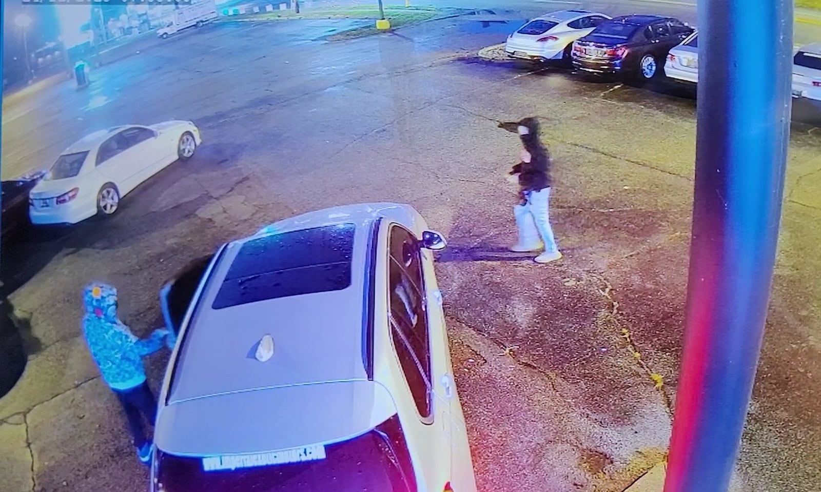 Suspects in the parking lot of Imperial Exotic Motors in Hamilton stealing cars from the parking lot on Dixie Highway. SUBMITTED