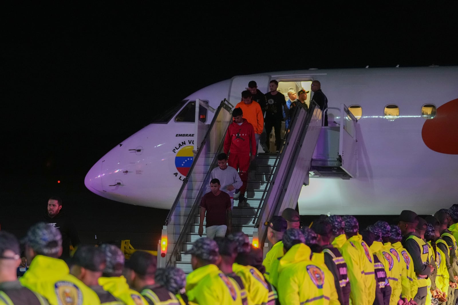 Venezuelan migrants deported from the United States arrive at Simon Bolivar International Airport in Maiquetia, Venezuela, Monday, Feb. 10, 2025. (AP Photo/Ariana Cubillos)