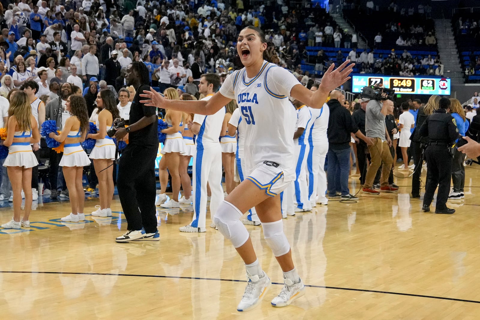 UCLA center Lauren Betts, center, celebrates after an NCAA college basketball game against South Carolina, Sunday, Nov. 24, 2024, in Los Angeles. (AP Photo/Eric Thayer)