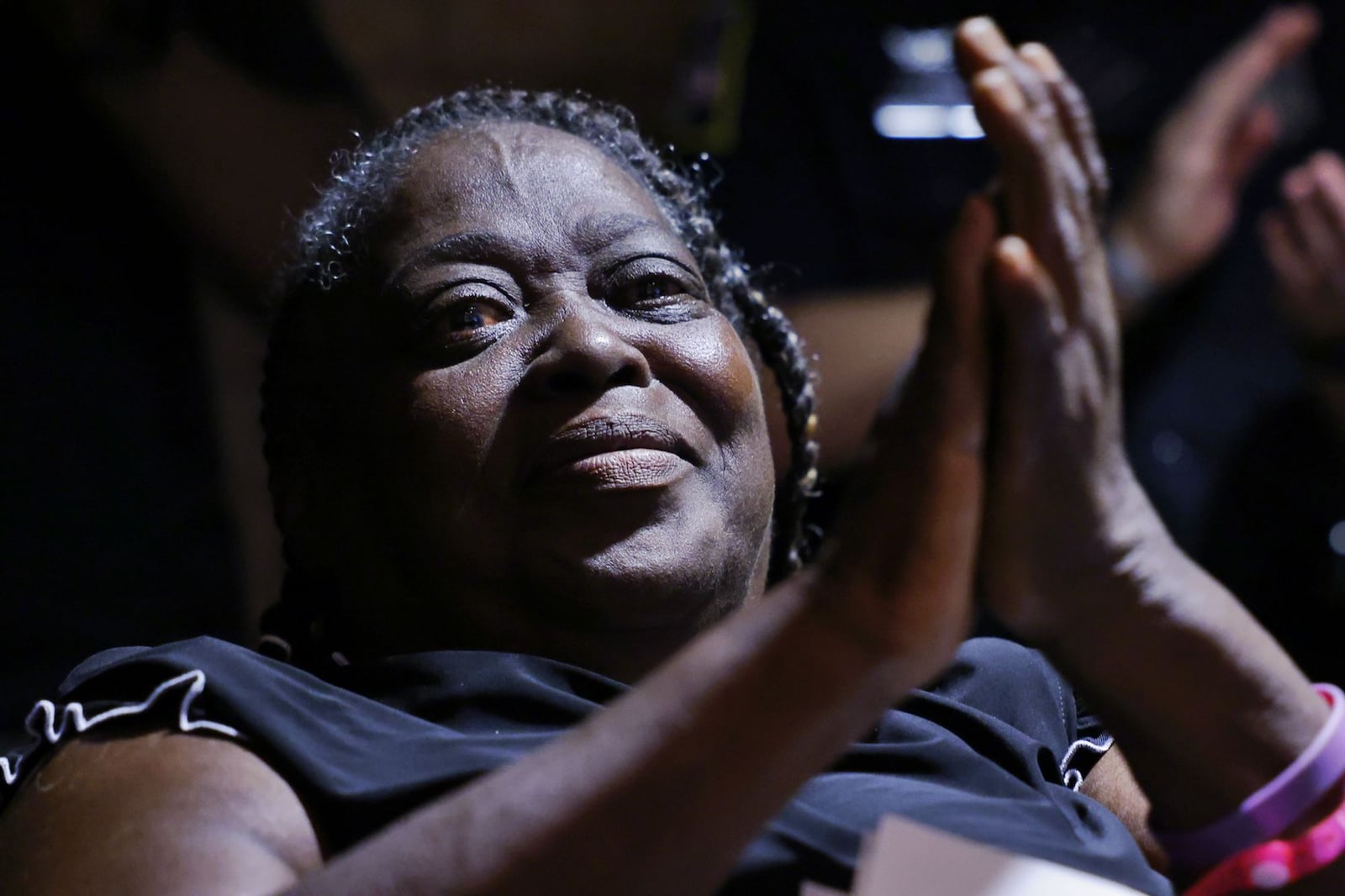 Ida Nelson cries as her son, Earl Nelson, is sworn in as Chief of Middletown Division of Police during the city council meeting Tuesday, Aug. 6, 2024 in Middletown. NICK GRAHAM/STAFF