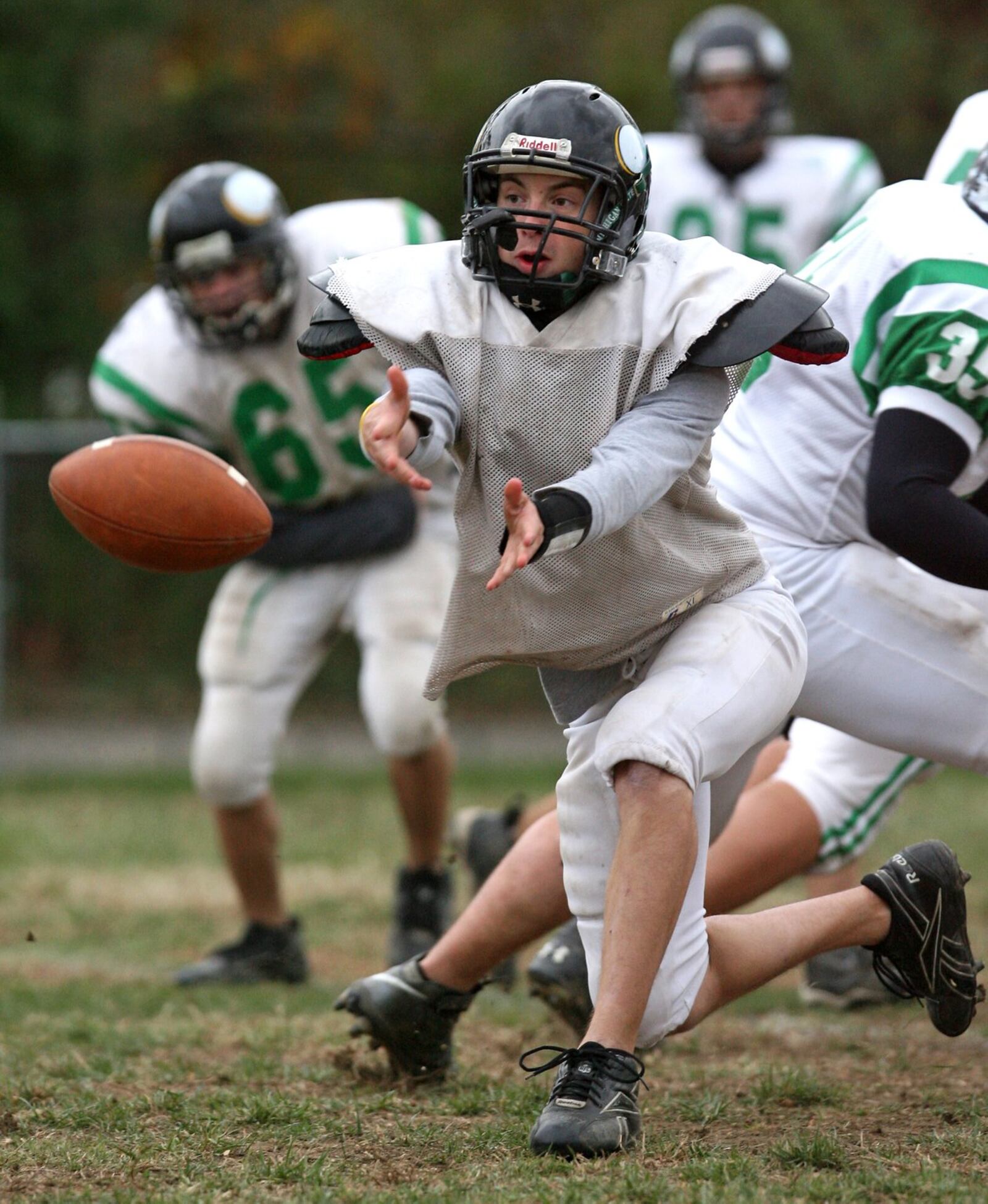 New Miami quarterback Jacob Lewis pitches the ball during a practice on Oct. 28, 2008, at New Miami. JOURNAL-NEWS FILE PHOTO