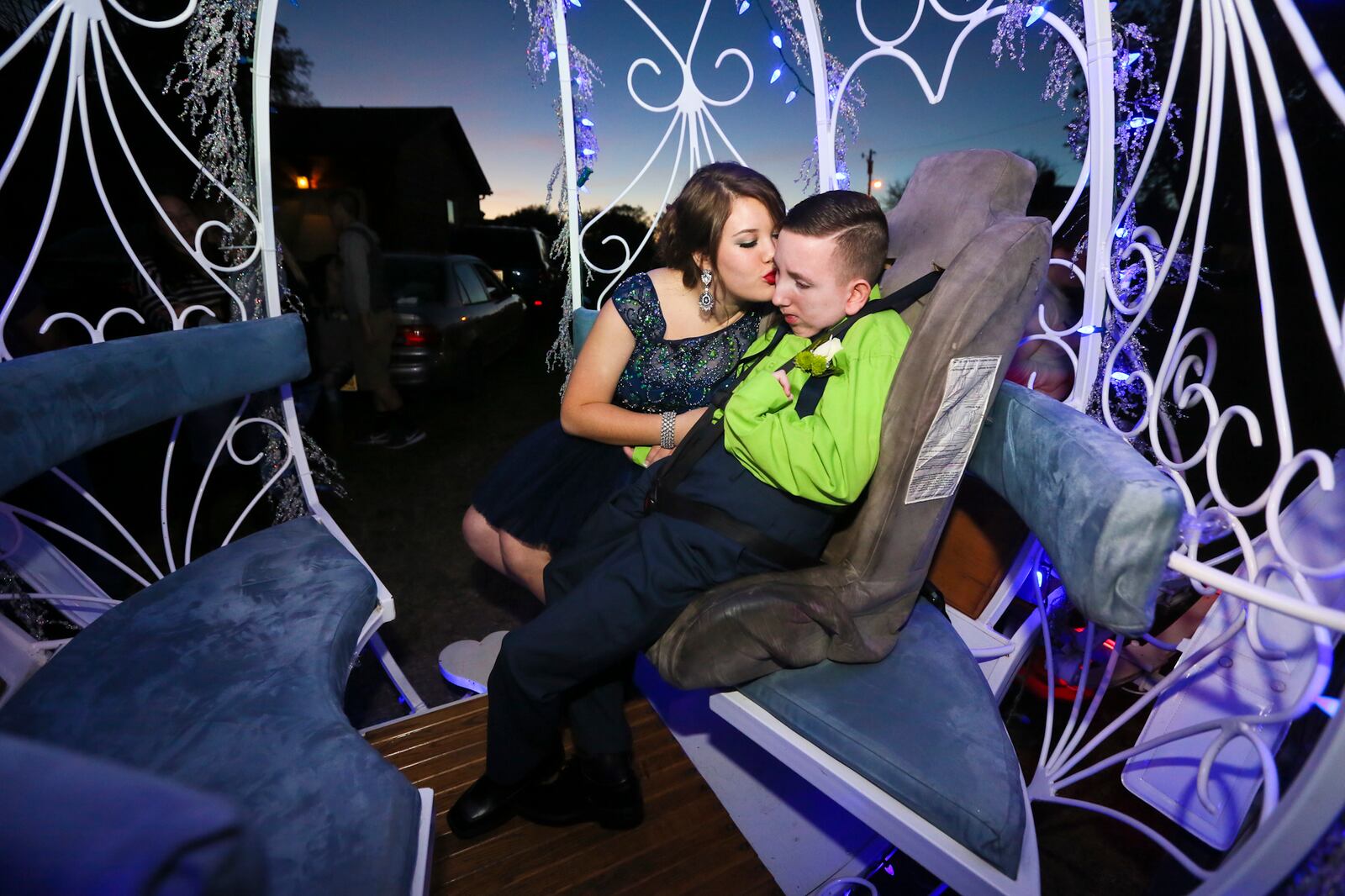 Marty Ary and his homecoming date, Alexis Taylor were surprised to find out they were going to ride in a horse-drawn carriage, provided by the Cincinnati Carriage Company, to the dance, Saturday, Oct. 10, 2015. Marty is in a wheelchair after he near drowning accident, but his limitations and restrictions hasn’t stopped the long time friends from enjoying their homecoming experience. I was so impressed with Alexis and her true affection for Marty, they deserved to have a special night. GREG LYNCH / STAFF