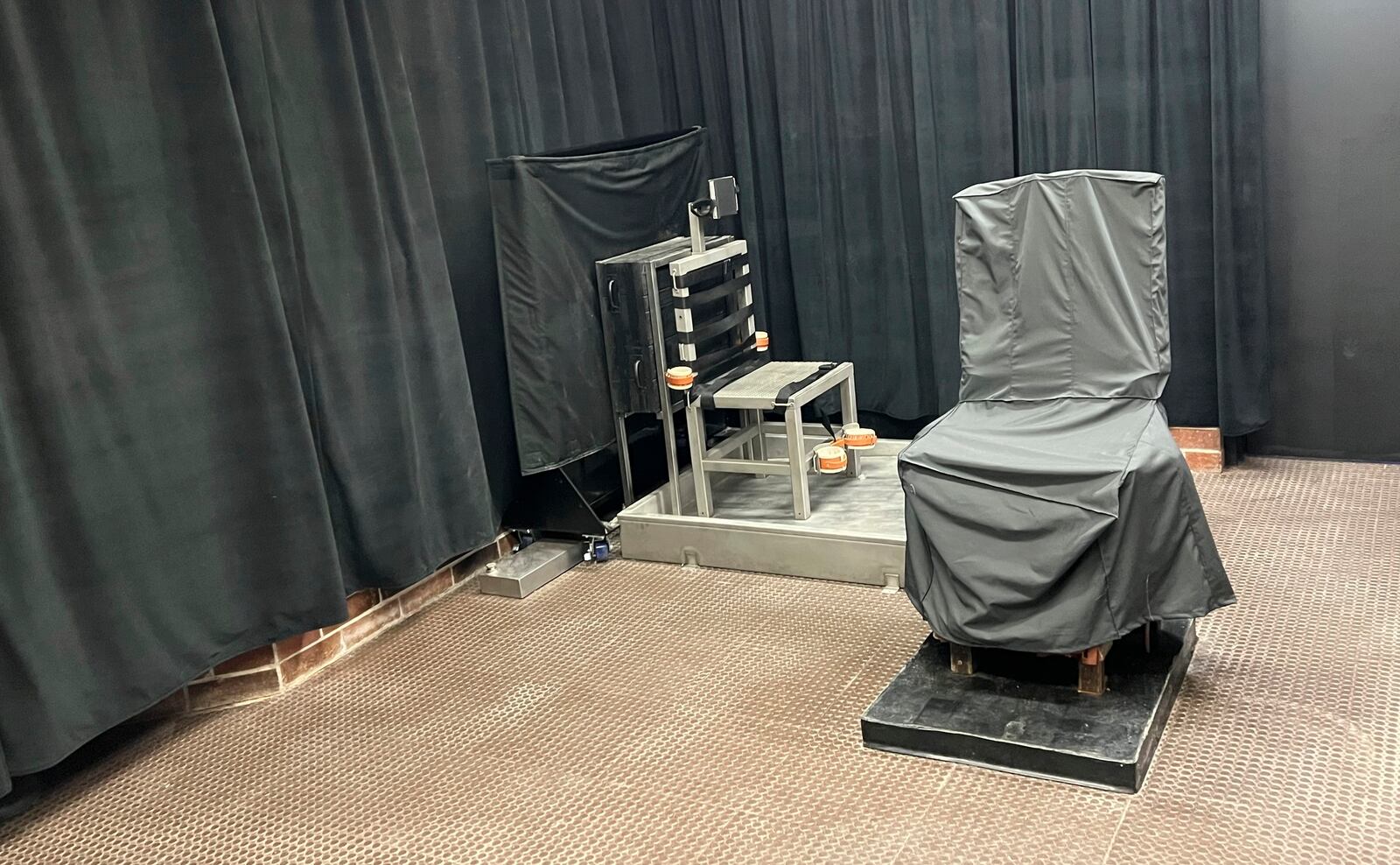 FILE - This photo provided by the South Carolina Department of Corrections shows the state's death chamber in Columbia, S.C., including the electric chair, right, and a firing squad chair, left. (South Carolina Department of Corrections via AP, File)