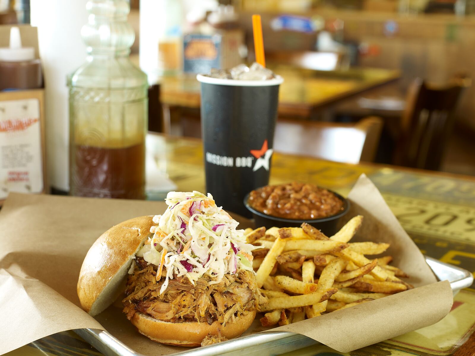 Pulled pork with fries inside is one of the dishes served at Mission BBQ. 