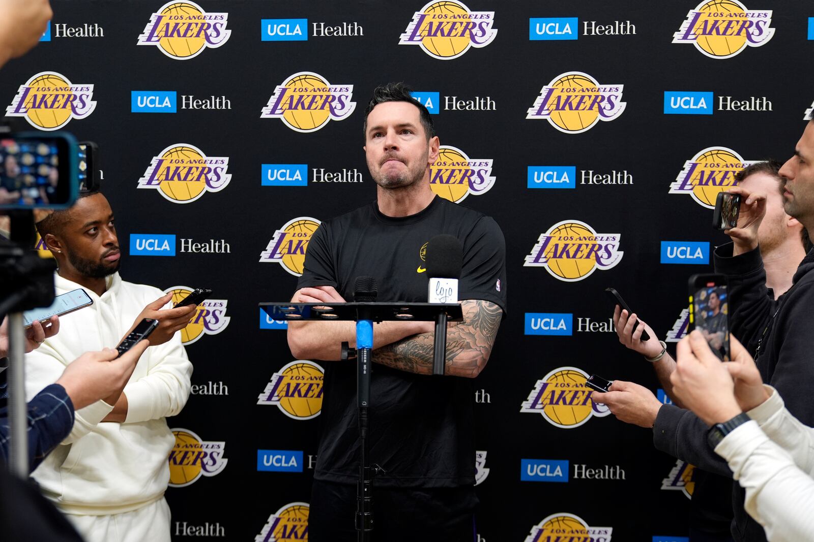 Los Angeles Lakers coach JJ Redick recounts that he and his family lost their house in the deadly Pacific Palisades wildfire during an NBA basketball news conference at the UCLA Health Training Center in El Segundo, Calif., Friday, Jan. 10, 2025. (AP Photo/Damian Dovarganes)