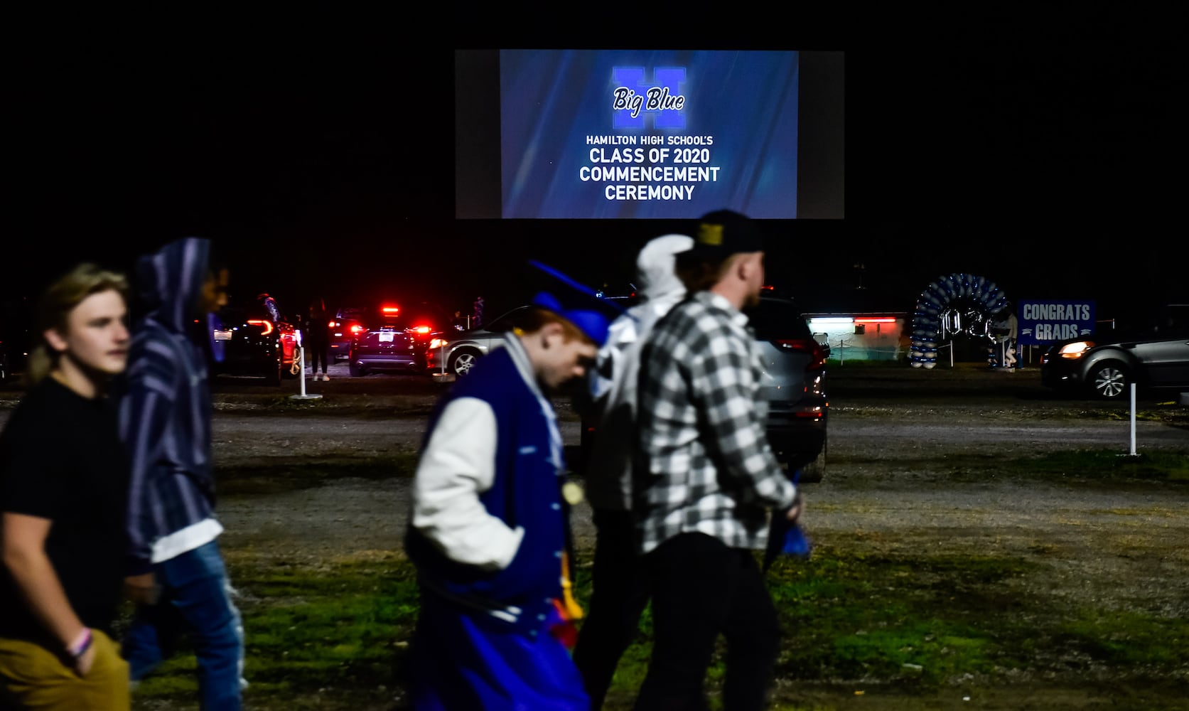 Hamilton High School seniors celebrate graduation at Holiday Auto Theatre drive-in