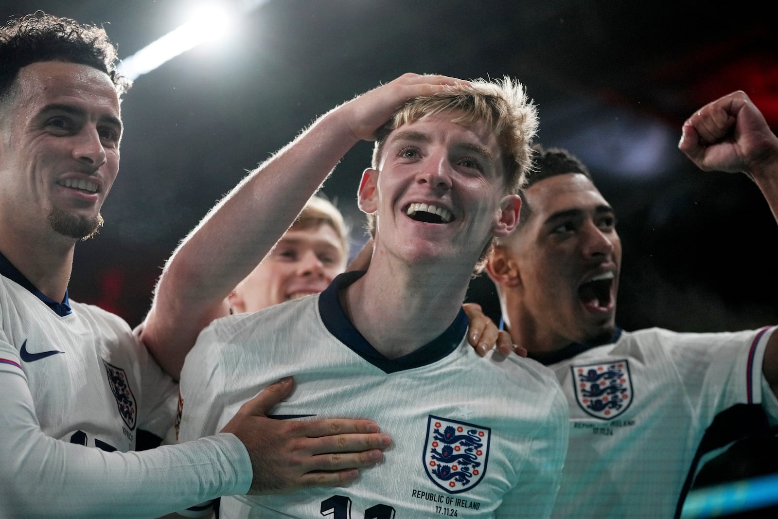 England's Anthony Gordon, center, celebrates after scoring his side's second goal during the UEFA Nations League soccer match between England and the Republic of Ireland at Wembley stadium in London, Sunday, Nov. 17, 2024. (AP Photo/Kin Cheung)