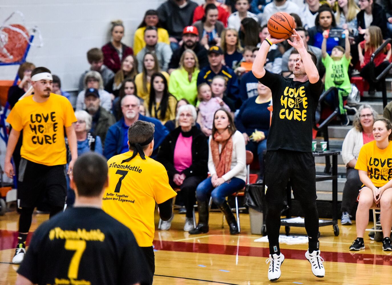 Two Butler County schools hold basketball game to benefit Madison teen battling cancer