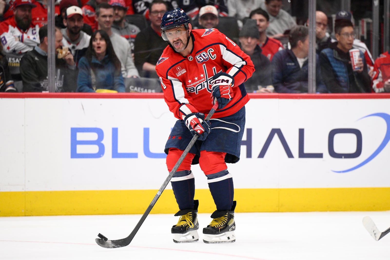 Washington Capitals left wing Alex Ovechkin passes the puck during the second period of an NHL hockey game against the Calgary Flames, Tuesday, Feb. 25, 2025, in Washington. (AP Photo/Nick Wass)