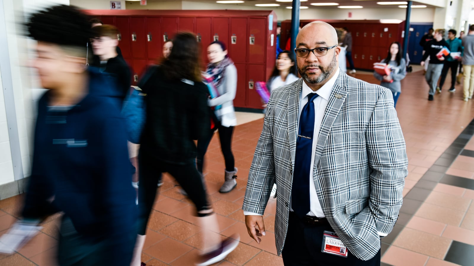 Lakota West High School principal G. Elgin Card stands in the hall of the school in West Chester Township. NICK GRAHAM/STAFF