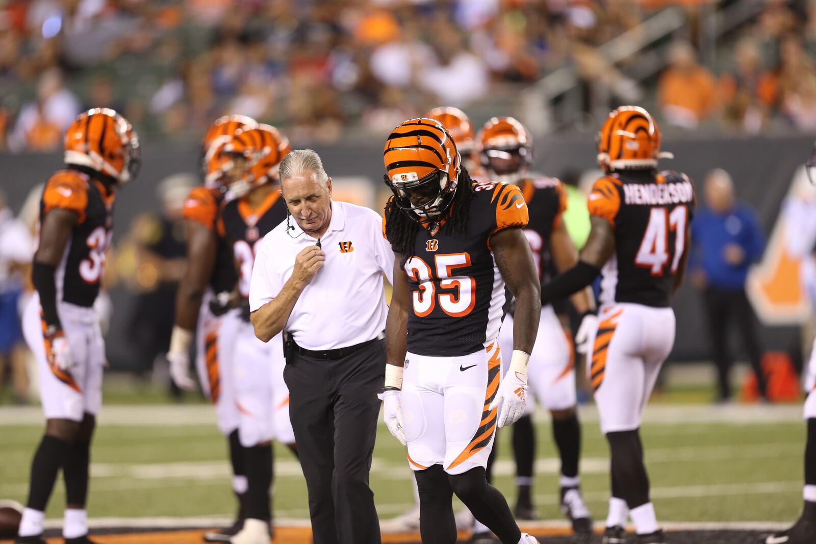 Paul Sparling helps Bengals player off field. When Sparling, a Stebbins High and Wilmington College graduate semi-retired this spring after 30 seasons as the head athletic trainer of the Cincinnati Bengals, he had the second longest tenure of any trainer in the NFL and a resume filled with achievements, be it in caring for Bengals players or opening doors for student trainers and minorities to follow in his footsteps. Two years ago he was named the NFL’s most outstanding trainer. He’s in the Wilmington College Hall of Fame and on May 6 he was inducted into the Ohio Trainers Hall of Fame. This week though his attention returns to the Miami Valley, where he’ll give the eulogy for his 95-year-old mother, who passed away four days ago and then give the commencement speech at the Nutter Center for the graduating seniors at Stebbins High, in what he calls a “come full circle” moment.  CONTRIBUTED