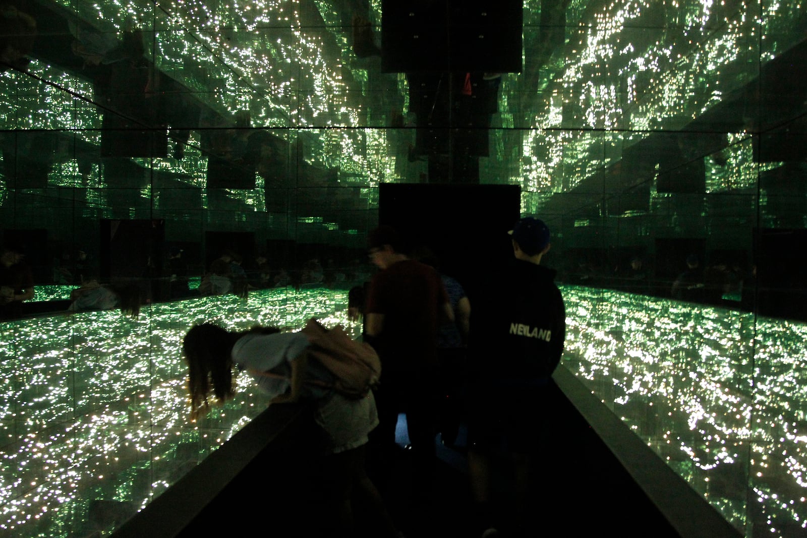 The Infinity Room at the Armstrong Air & Space Museum gives visitors an idea of what it might look like to roam through space. LISA POWELL / STAFF